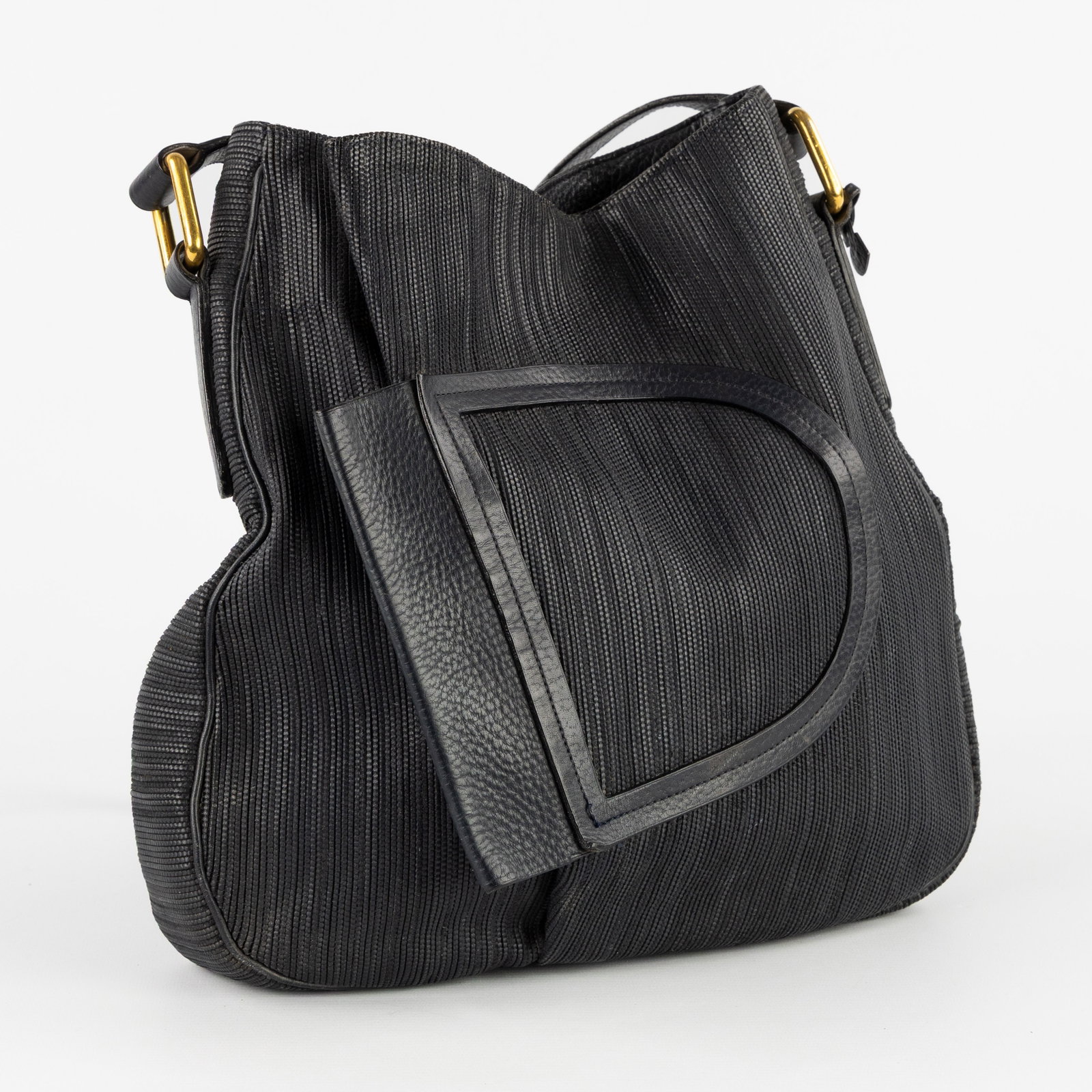 Delvaux, a vintage toile de cuir crossbody shoulder bag, blue leather.: Delvaux, a vintage toile de cuir crossbody shoulder bag, blue leather. Blue leather and gold-plated hardware.Toile de cuire.Includes original protective cover/dust bag. Dimensions: (W:33 x H:33 x L:7 