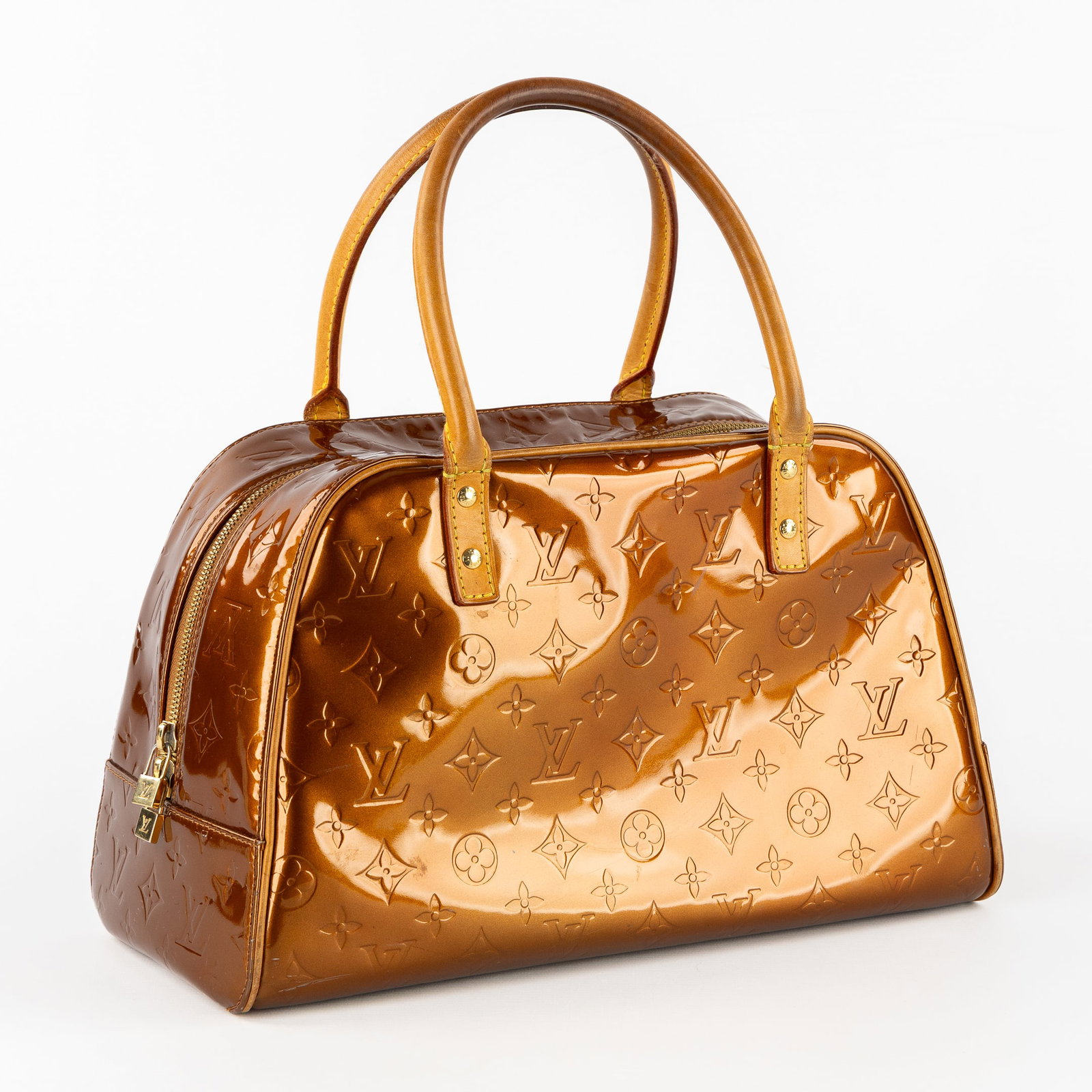 Louis Vuitton, Tompkins Square Monogram, Vernis, a Handbag, Leather.: Louis Vuitton, Tompkins Square Monogram, Vernis, a Handbag, Leather. Bronze/gold-tone.Leather and lacquered leather.With LV monogram.With original purchase receipt (LV Knokke). Dimensions: (W:36 x H:2