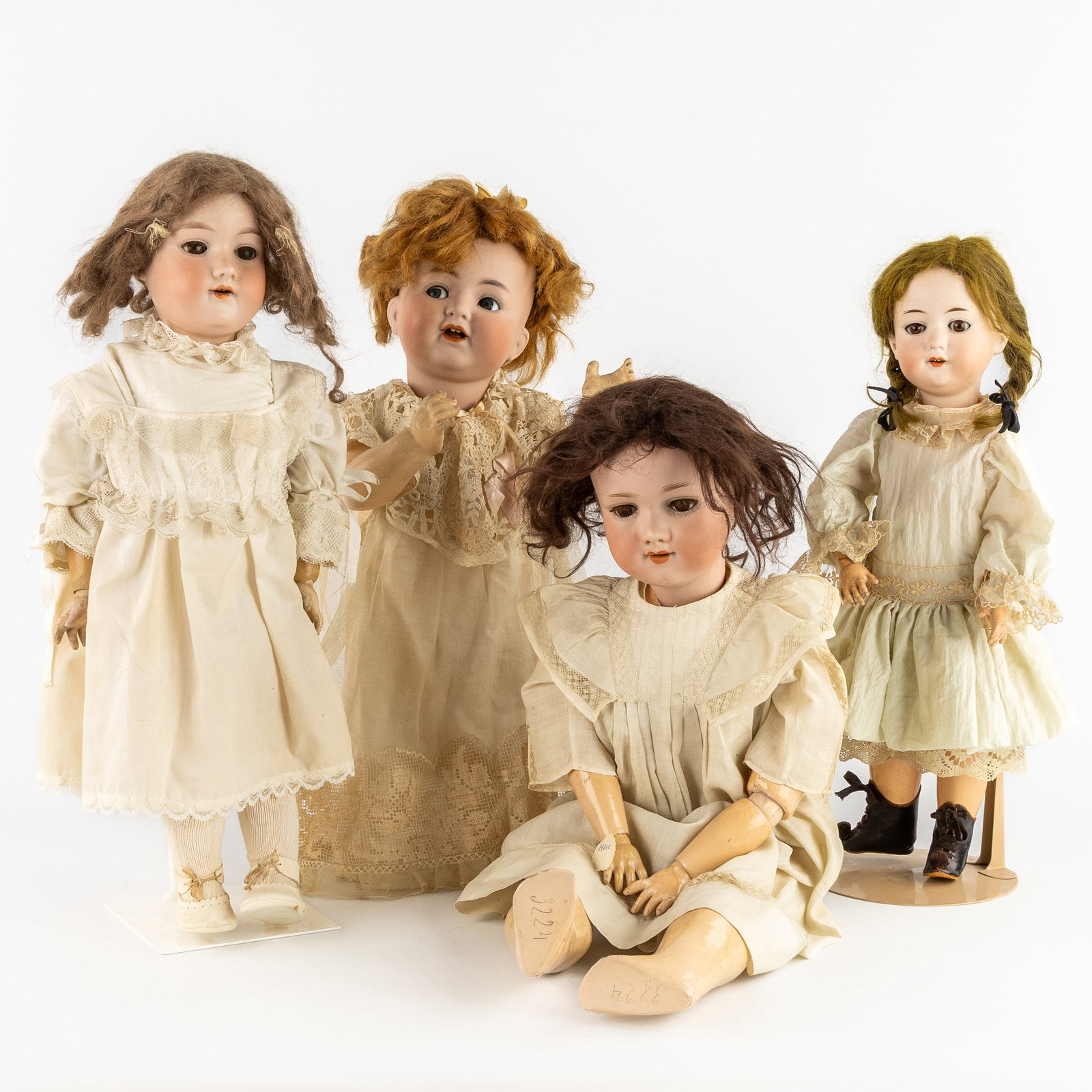 Armand Marseille and Kämmer & Rheinhardt, three girl dolls and a baby doll, Biscuit porcelain, (1 of 7)