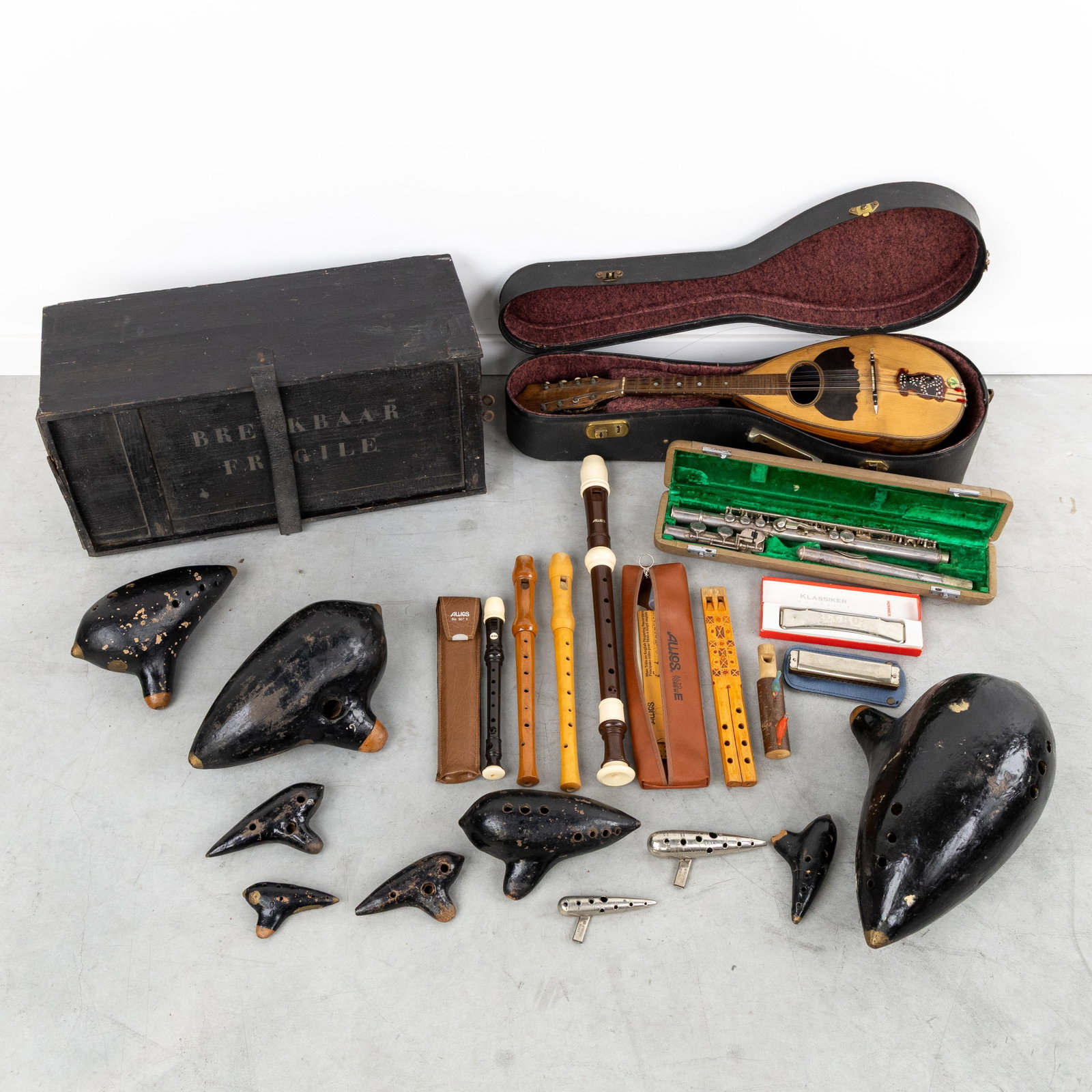 A Collection of musical instruments, with Napoli Dco Brambilla mandolin, flutes, harmonicas, and an (1 of 6)