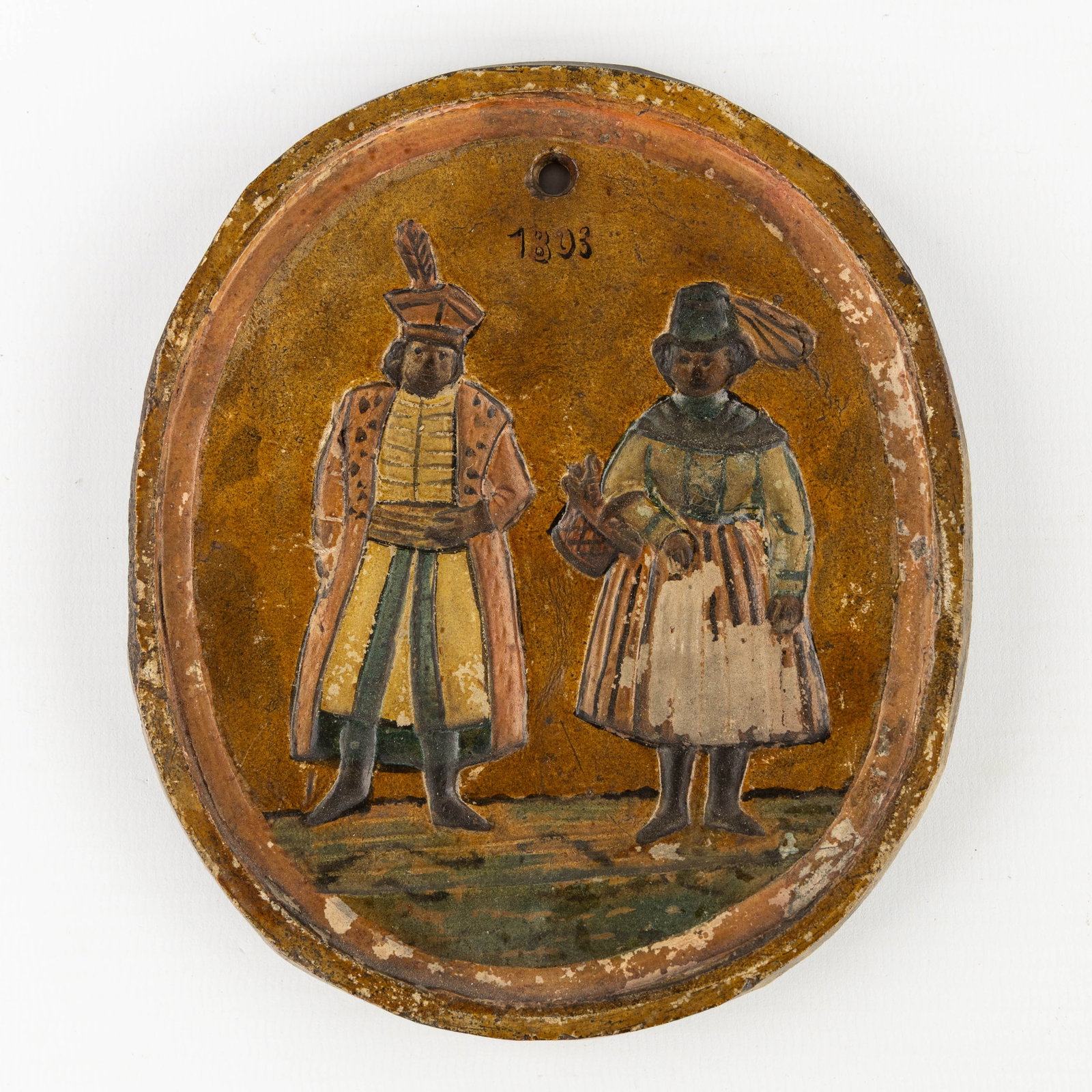 An Antique Bruges patacon with two figures and dated '1803', patinated pipe clay, 19th C. (1 of 4)