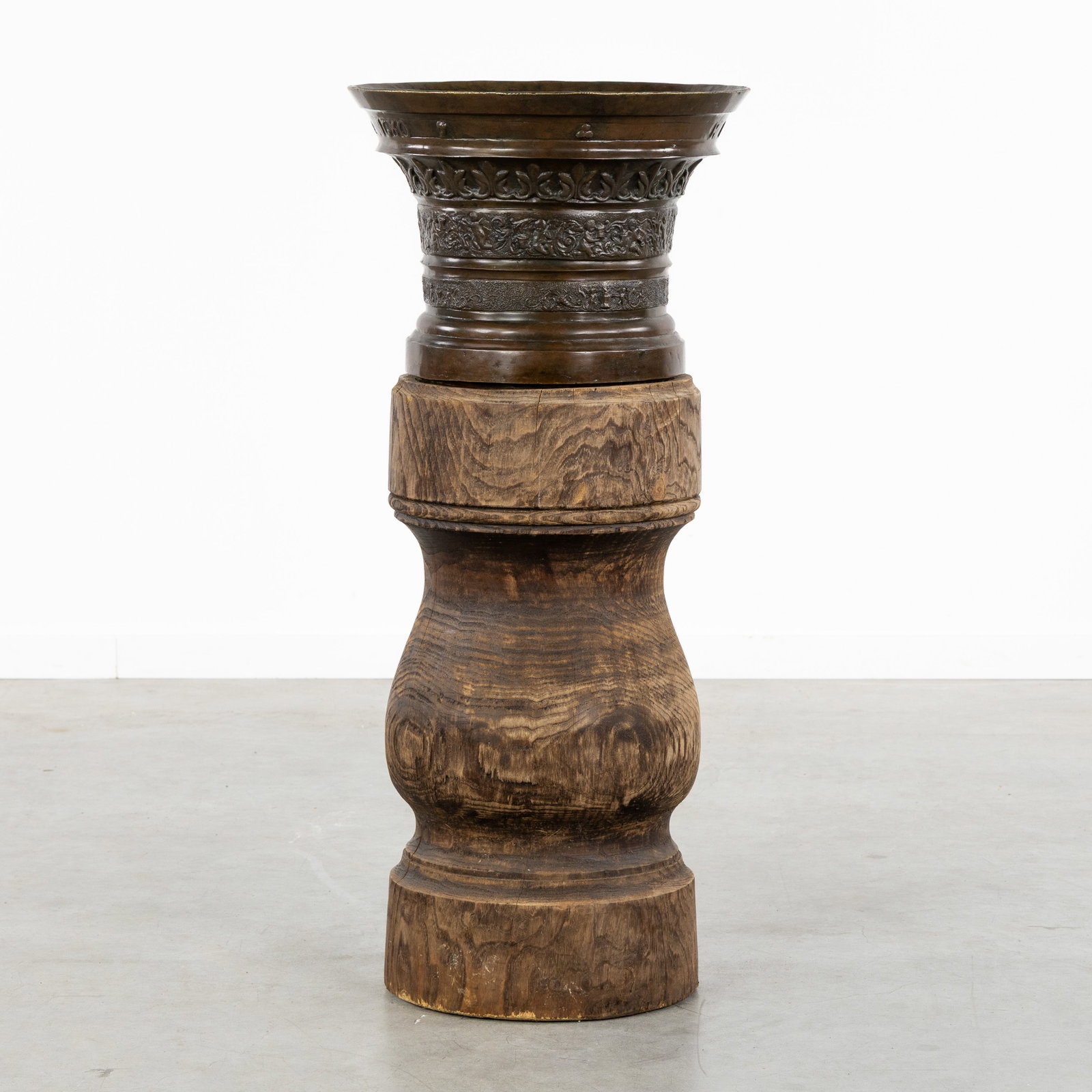 A Large antique bronze mortar on a stand, signed and dated 'J.B. Wierinck - 1680', with putti,: A Large antique bronze mortar on a stand, signed and dated 'J.B. Wierinck - 1680', decorated with putti, Flanders, 19th century. Patinated bronze.Mortar with three bands, two of which are decorated wi