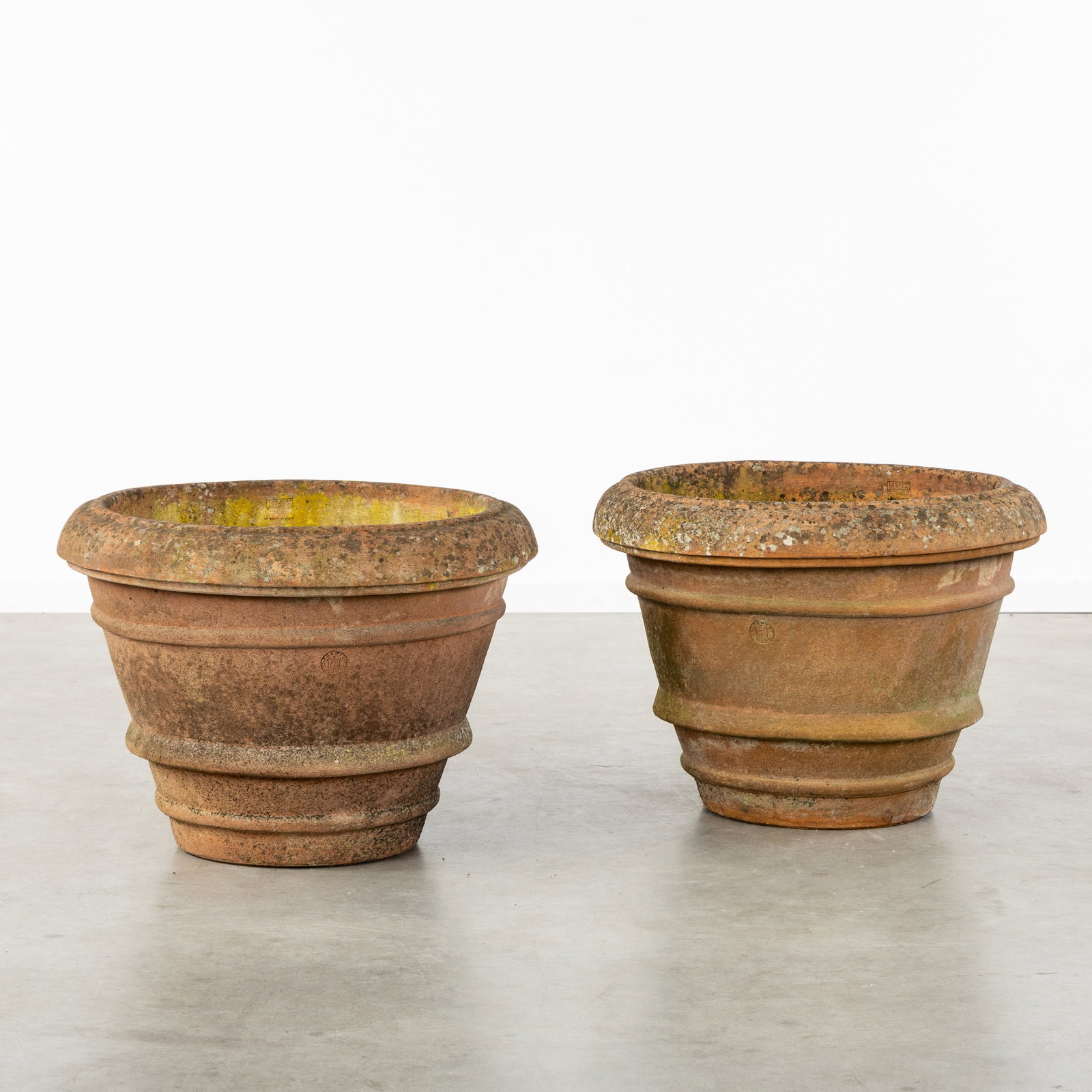 A Pair of large Italian terracotta garden pots or planters, Buropa, Impruneta, Italy, 2009.: A Pair of large Italian terracotta garden pots or planters, Buropa, Impruneta, Italy, 20th century, 2009. Terracotta.Marked 'Buropa - Impruneta' and 