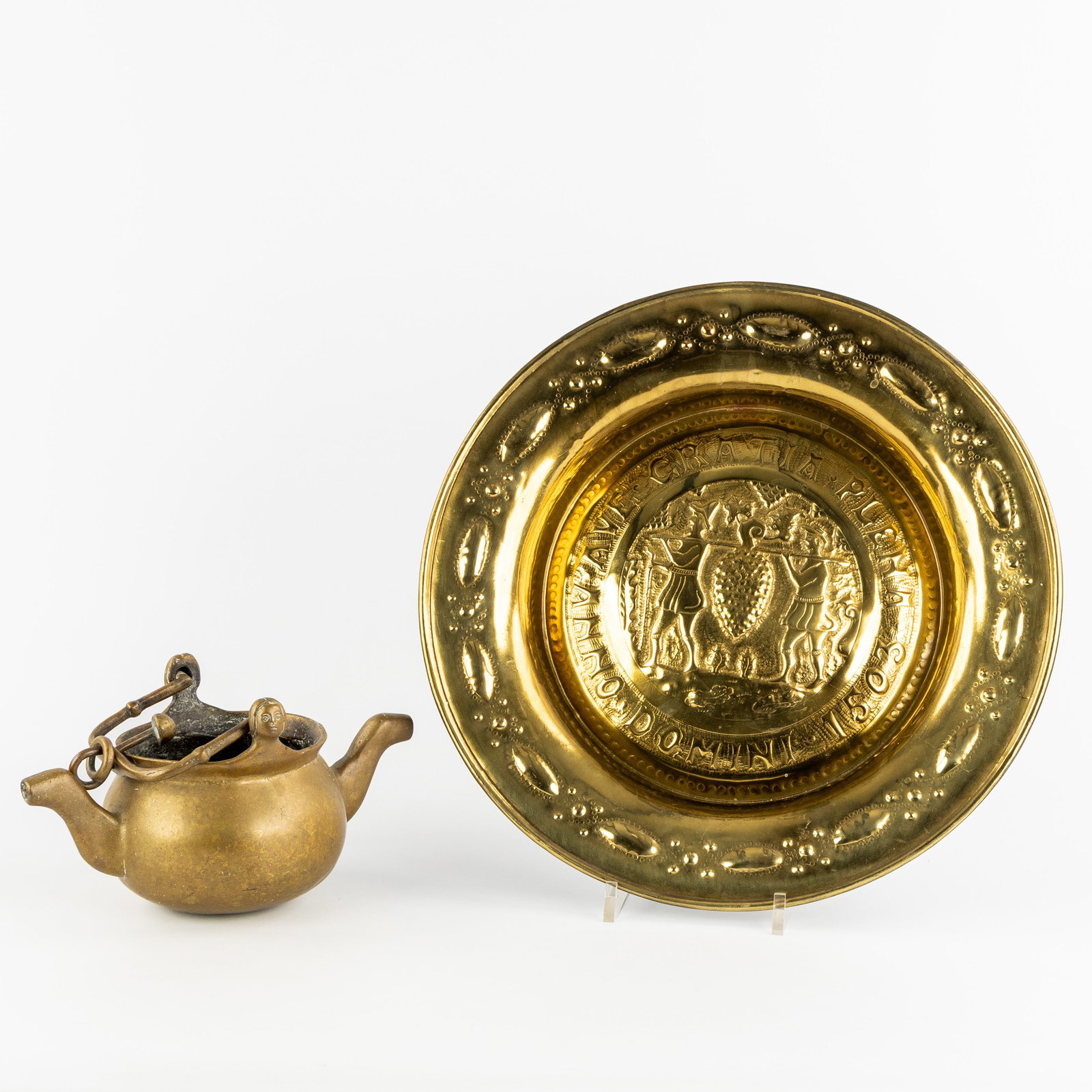 A 19th-century bronze 'Lavabo' water bowl, Flanders. Added, a brass baptismal bowl.: A 19th-century bronze 'Lavabo' water bowl, Flanders. Added, a brass baptismal bowl. Bronze.