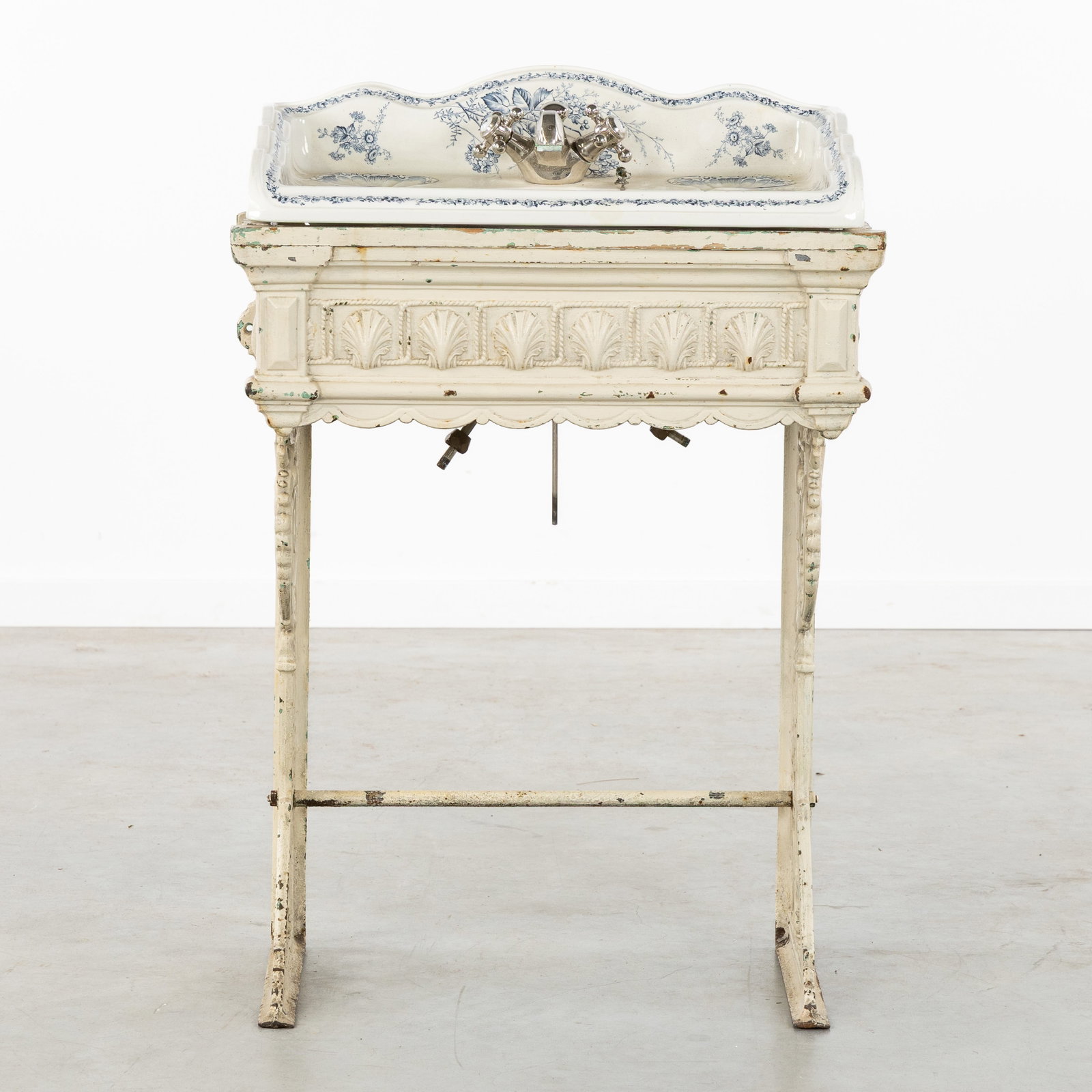 A Victorian sink or lavatory in Renaissance style, patinated cast iron and porcelain, England, circa (1 of 11)
