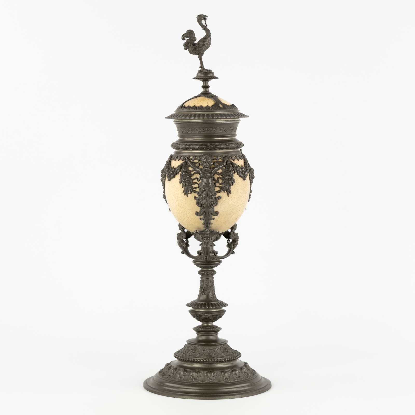 A Large and richly decorated Ostrich Cup or Goblet, pewter and ostrich egg, Renaissance style,: A Large and richly decorated Ostrich Goblet, pewter and ostrich egg, Renaissance style, Germany, circa 1900. Pewter and ostrich egg.Large ostrich cup or ostrich-egg goblet, a luxurious display cup for