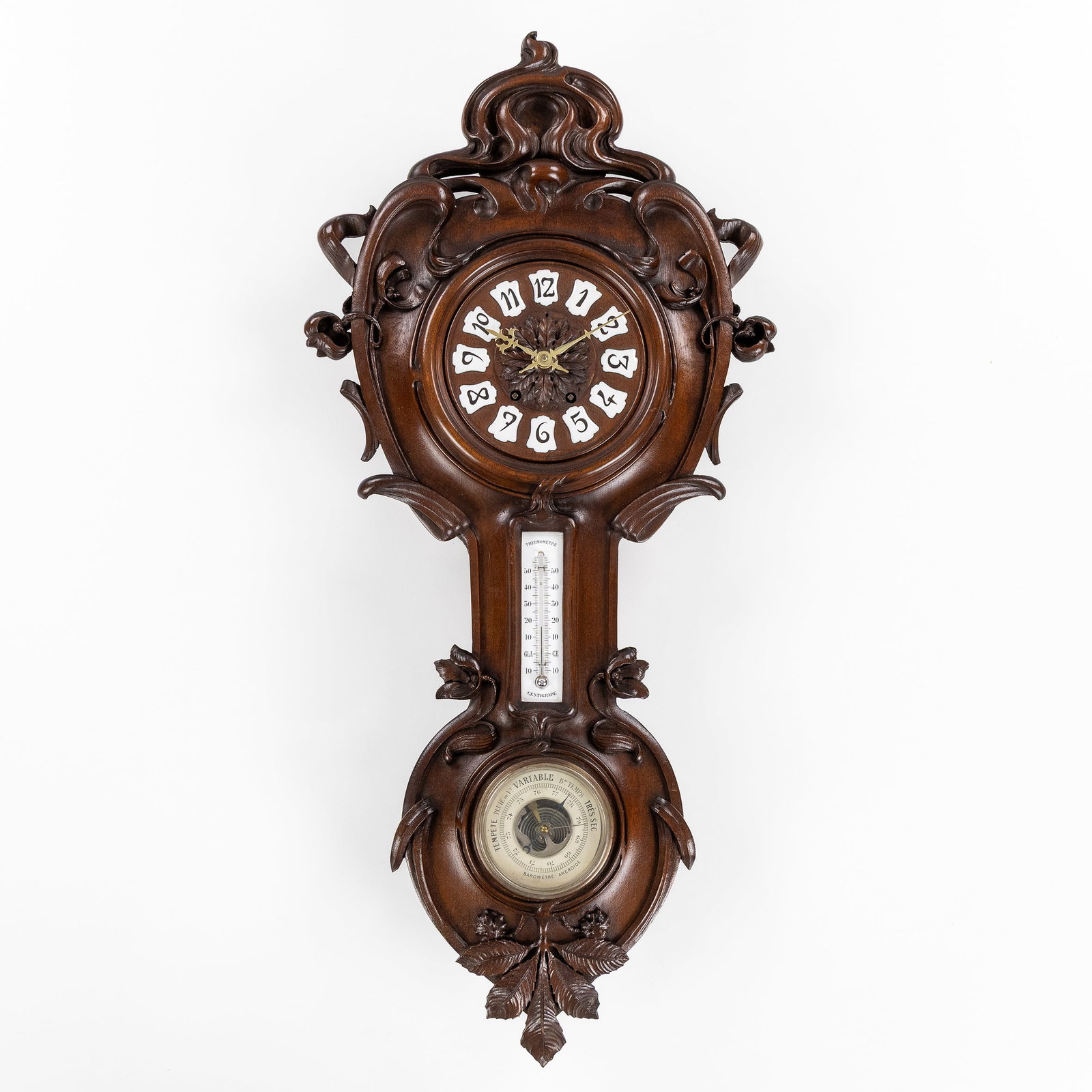 An Art Nouveau wall clock with thermometer and barometer. Sculptured wood, Art Nouveau, circa 1900. (1 of 6)