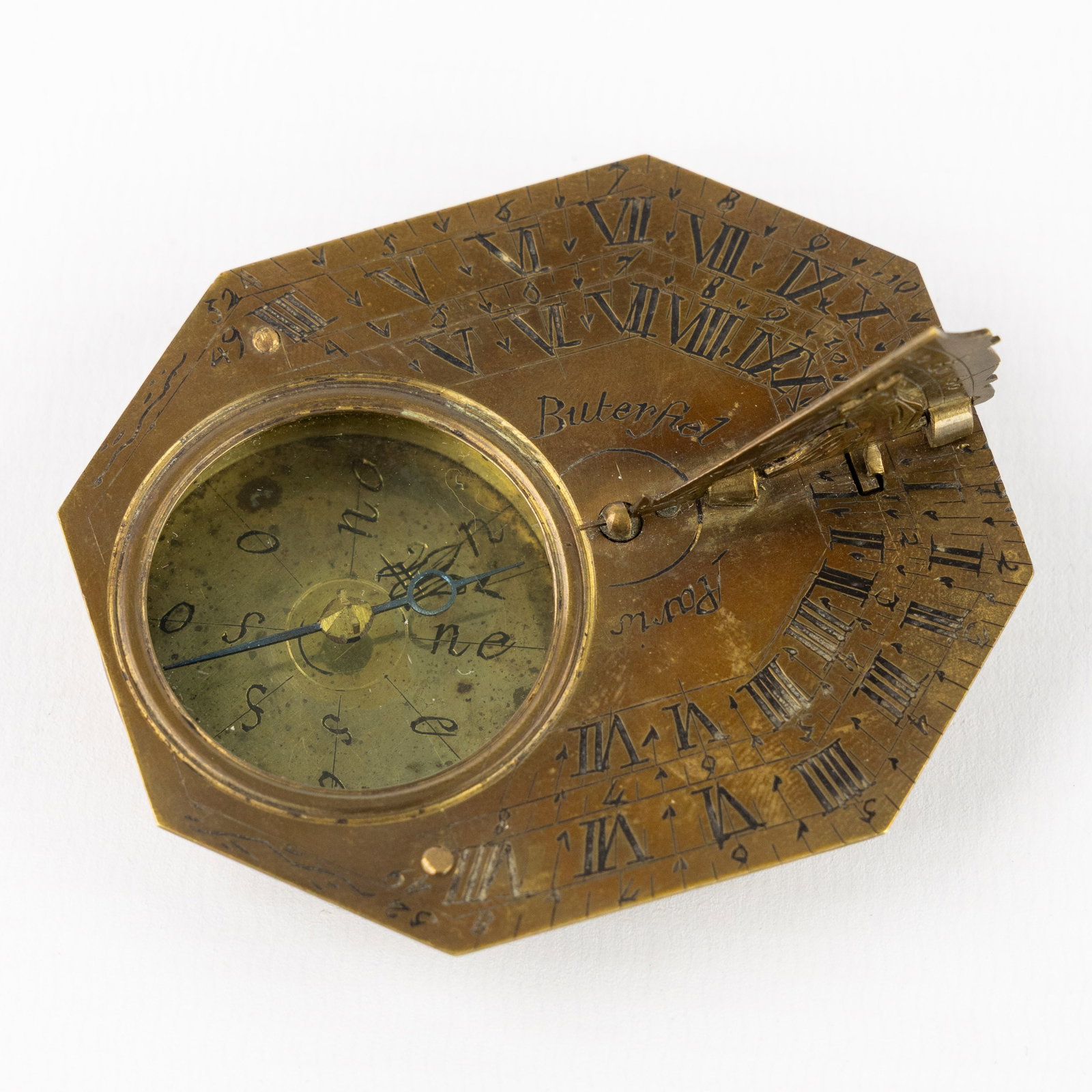 After Michael Butterfield (1635-1735), a brass sundial with compass or 'Butterfield' gnomon, 20th C. (1 of 6)