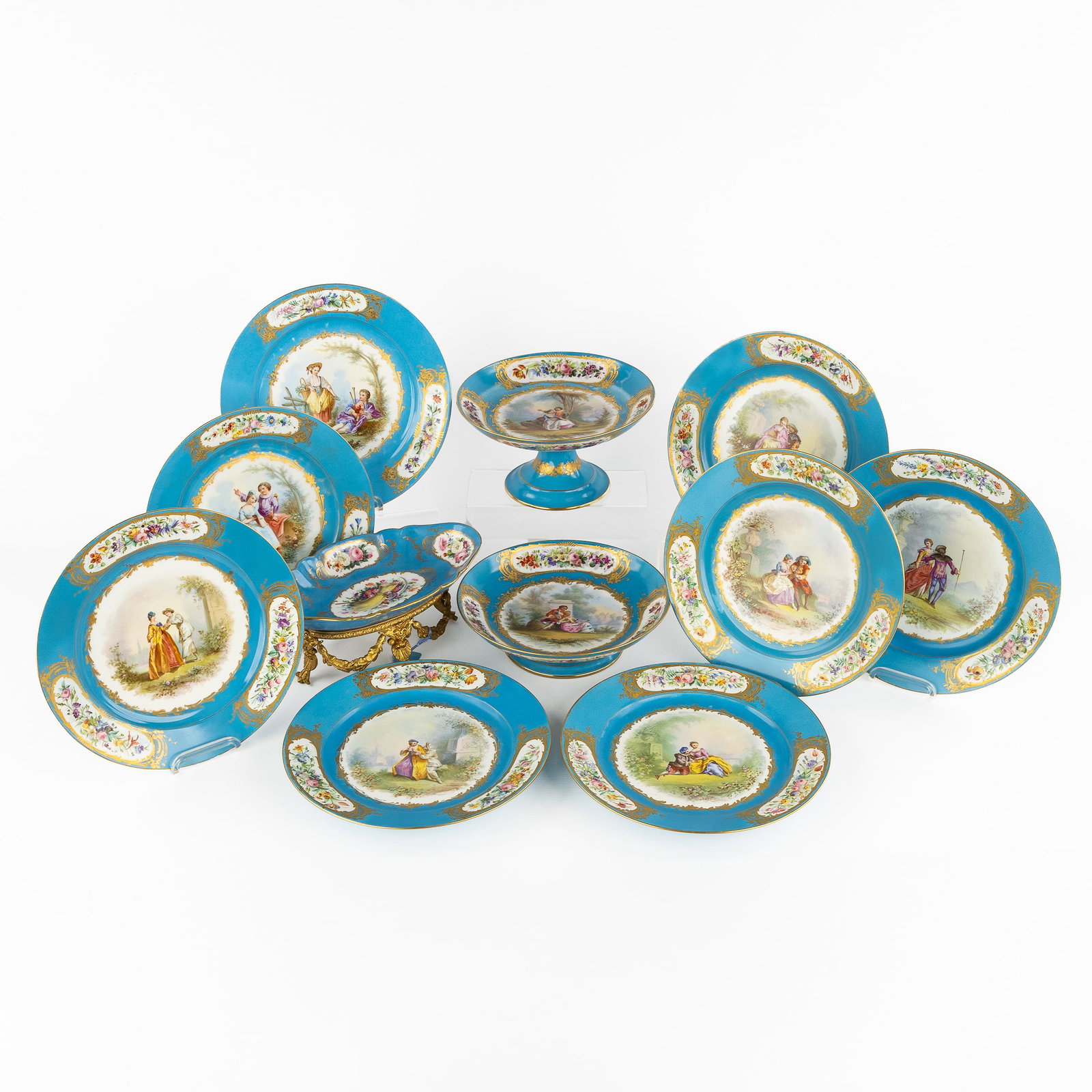 Sèvres, 'Bleu Céleste' porcelain, an antique 11-piece cake or pastry service with: Sèvres, 'Bleu Céleste' porcelain, an antique 11-piece cake or pastry service with hand-painted decorations, circa 1860. Sèvres porcelain. Bleu Céleste, with gilded and hand-painted