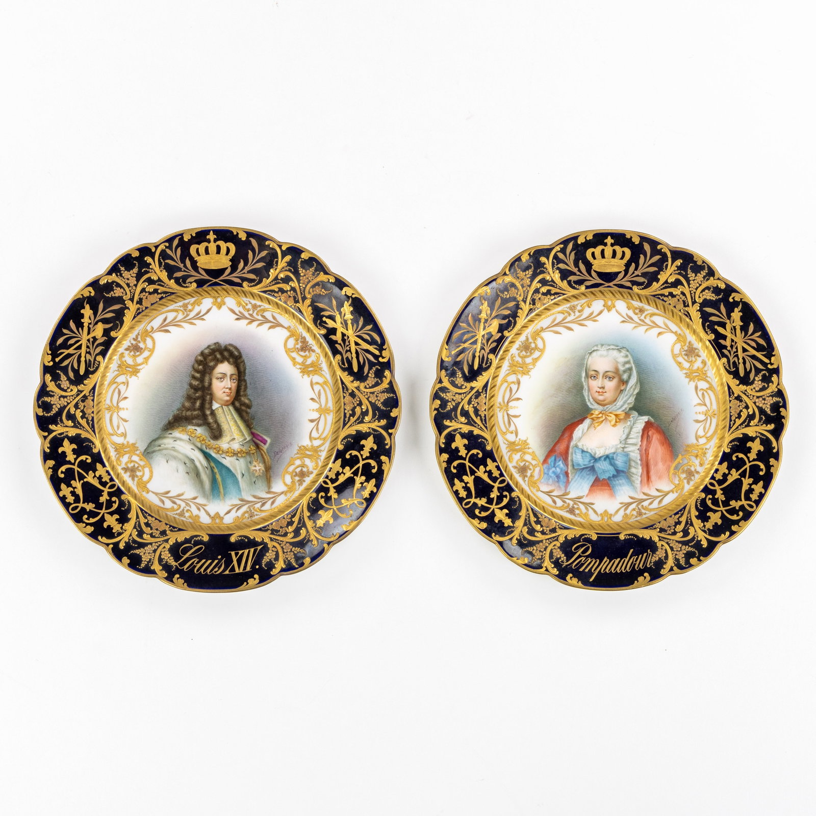 Sèvres, Chateau de Versailles, two 'Bleu Royal' plates with hand-painted portraits of Louis XIV: Sèvres, Chateau de Versailles, two 'Bleu Royal' plates with hand-painted portraits of Louis XIV and Madame de Pompadour, 19th century. Polychrome porcelain, with rich gilded finish. With hand-pai