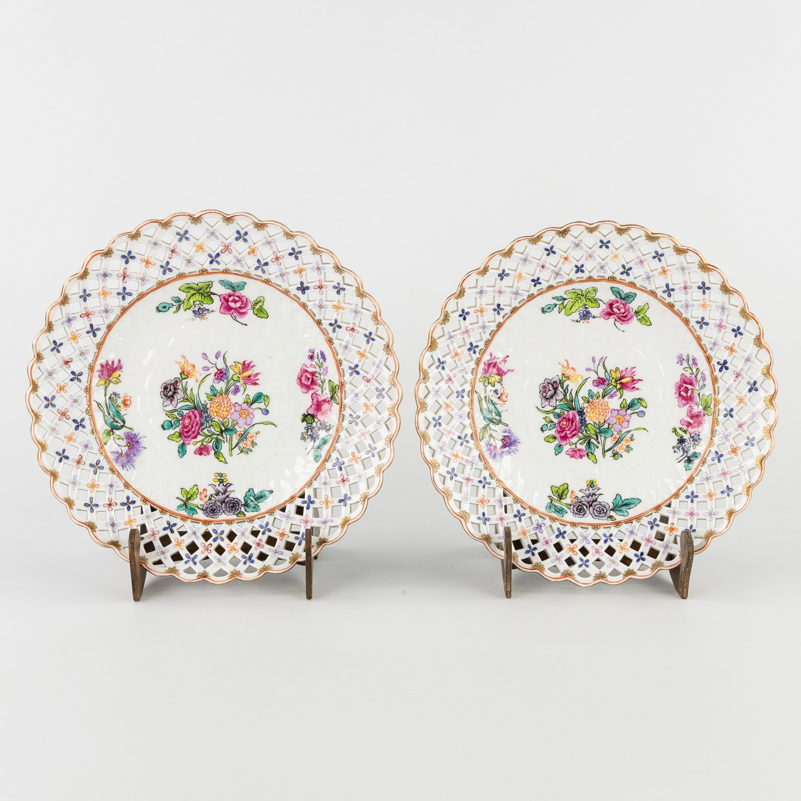 A Pair of florally decorated porcelain plates with openwork rim, Meissener marked, Germany, circa (1 of 5)
