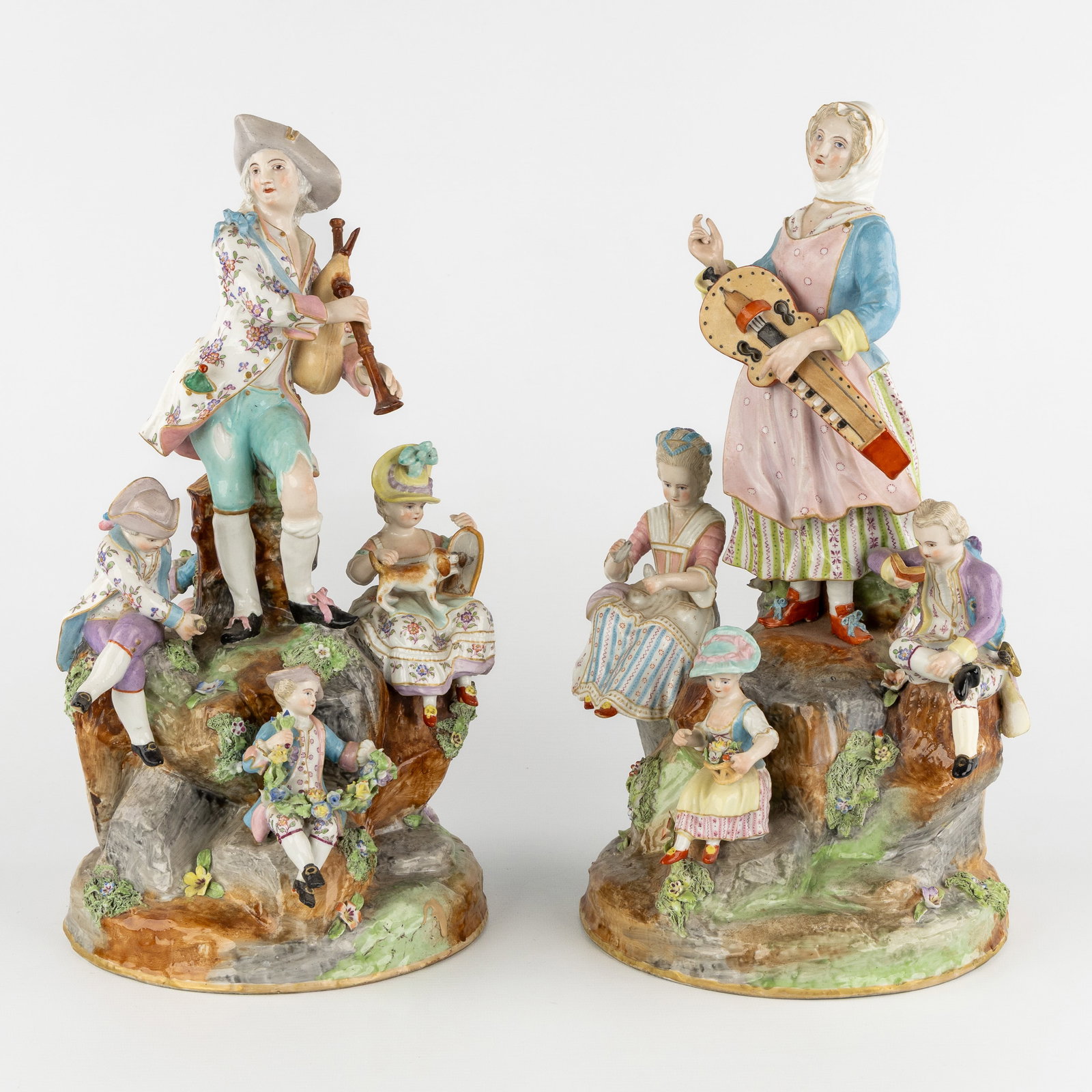 A Pair of large musical porcelain groups, 'Musician with Bagpipes' and 'Lady with Hurdy-Gurdy', (1 of 17)