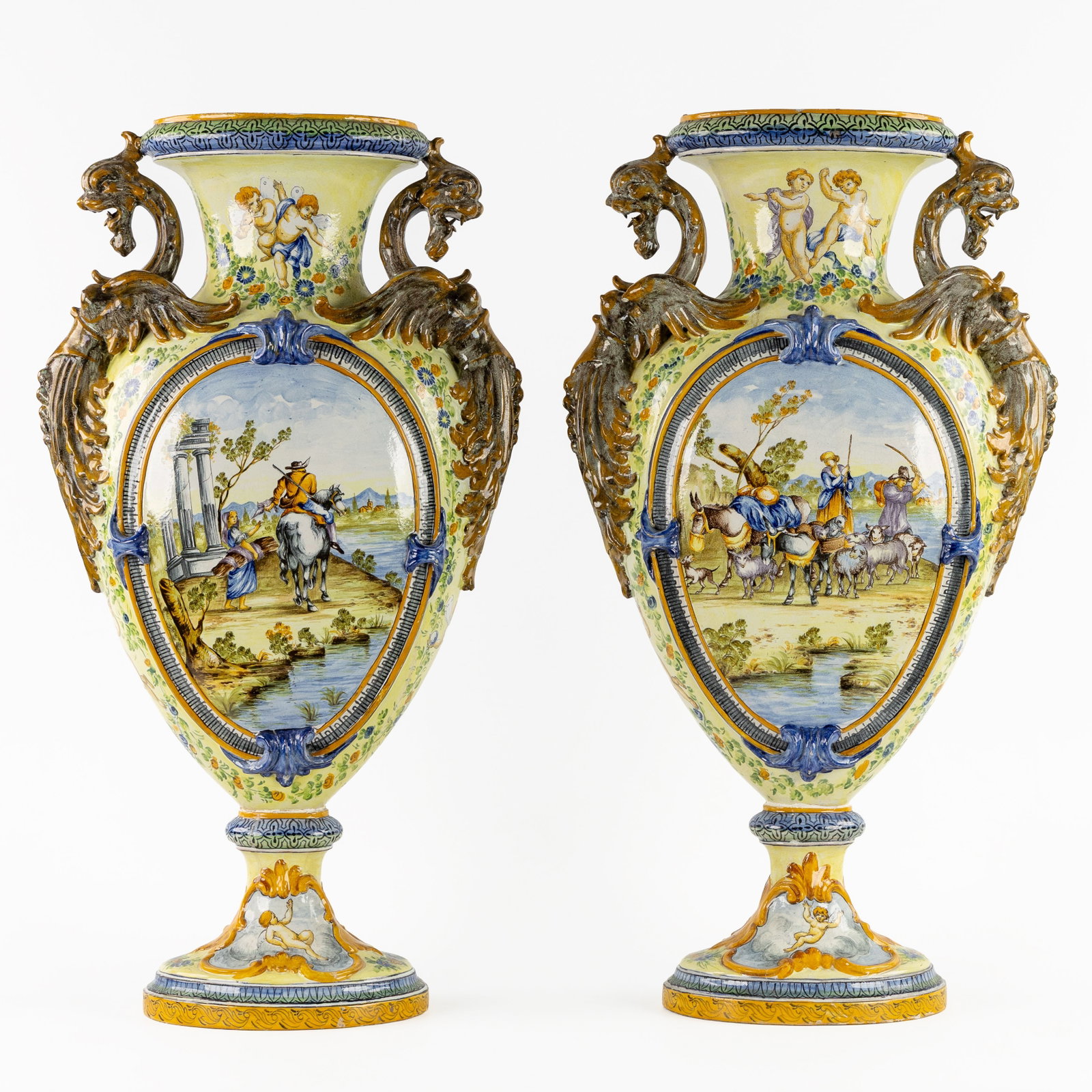 A Pair of large ornamental vases with pastoral scenes and putti. Majolica, Italy, 19th/20th C. (1 of 20)