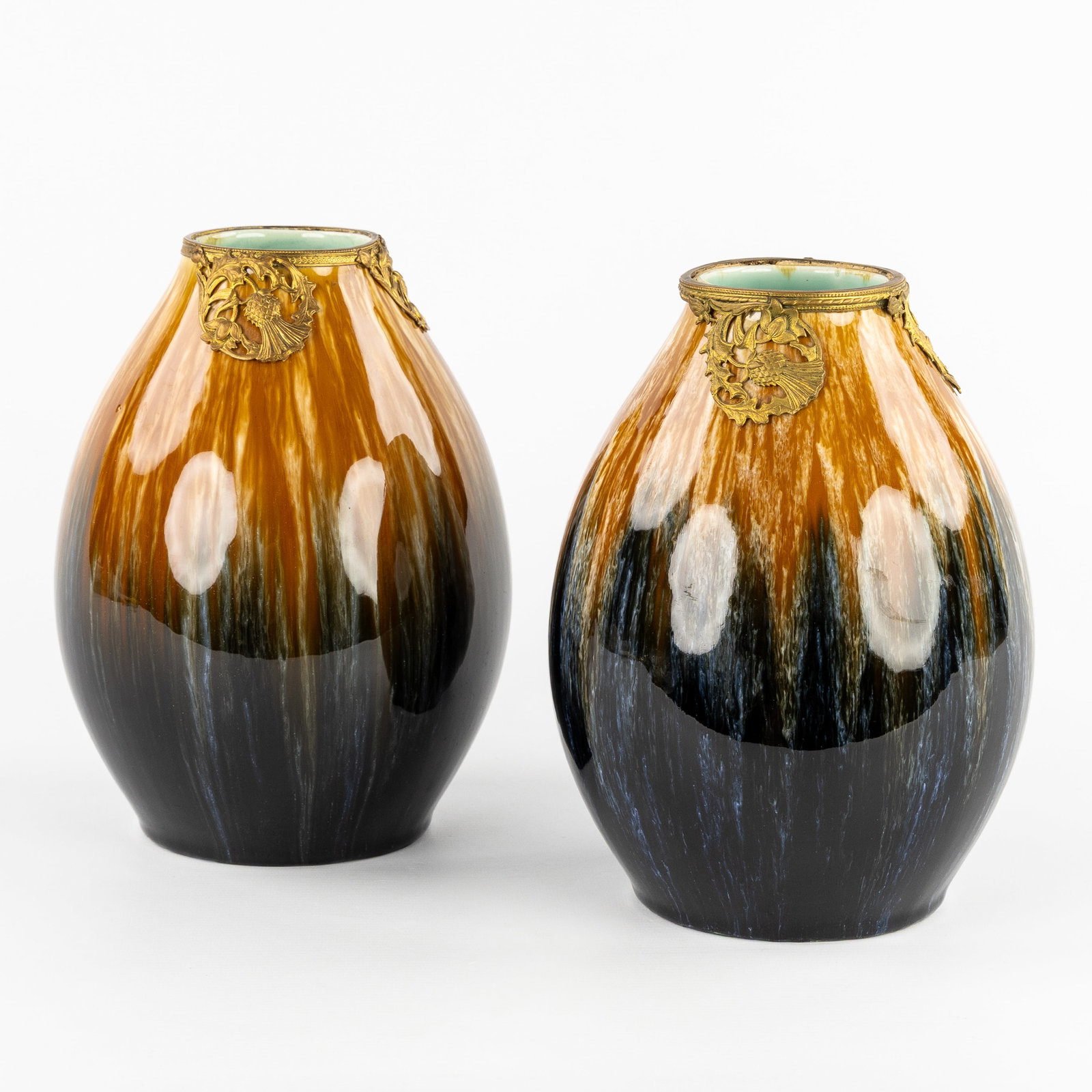 Boch Keramis, a pair of Art Nouveau vases with brass mount, glazed ceramics. (1 of 9)