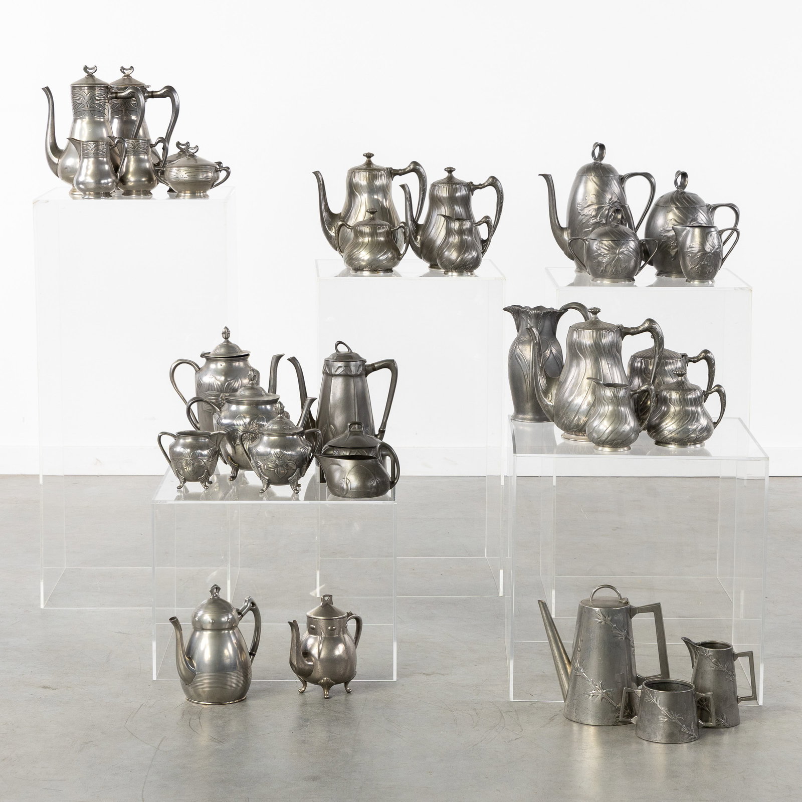 Gerhardi and others, a collection of pewter Art Nouveau coffee and tea sets, 31 pieces, Jugendstil, (1 of 8)