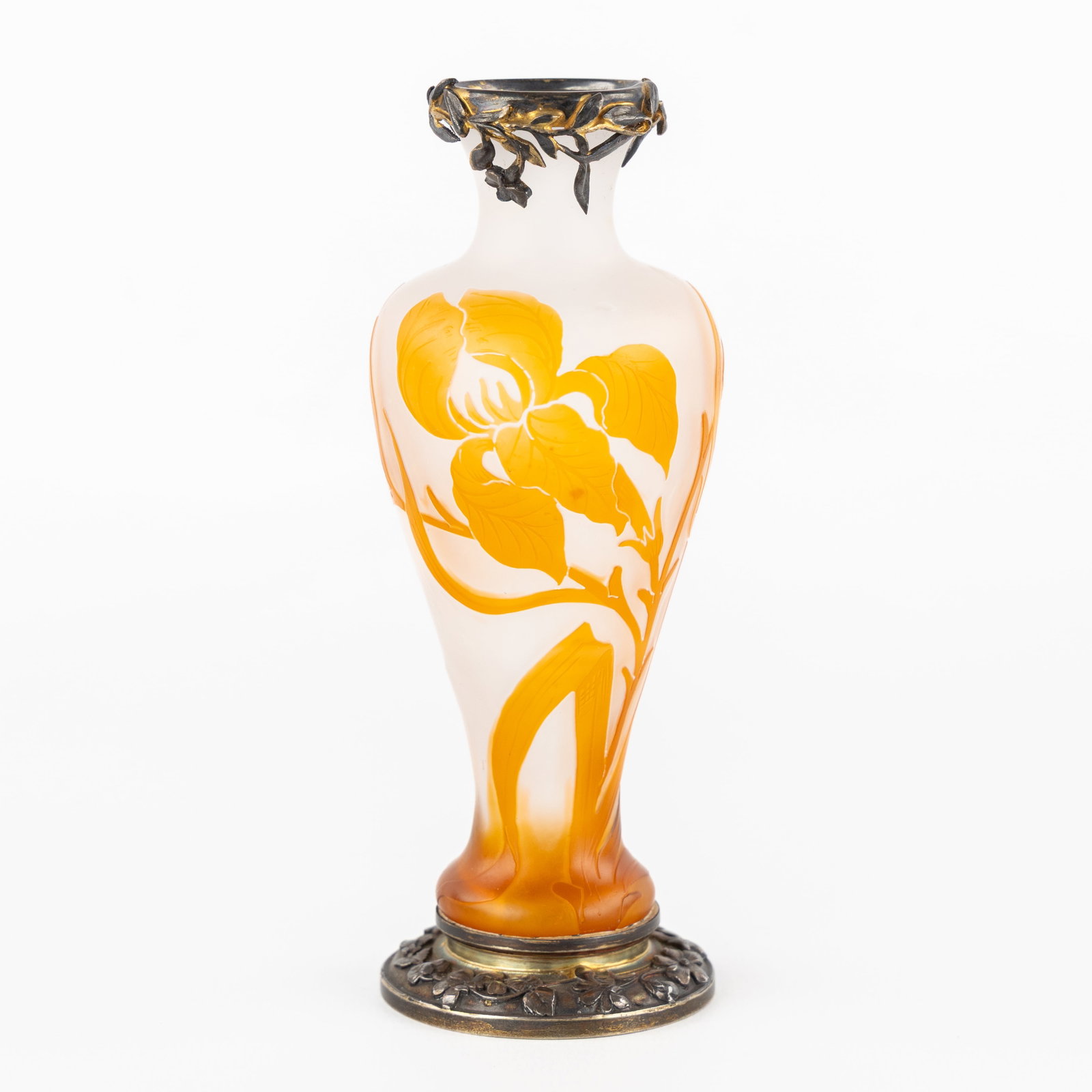 Cristallerie De Pantin, a small Art Nouveau vase with silver mount, pâte de verre glass, Art: Cristallerie De Pantin, a small Art Nouveau vase with silver mount, pâte de verre glass, Art Nouveau, circa 1900. Pâte de verre and silver.Floral decor with irises.Marked 'Cristallerie De