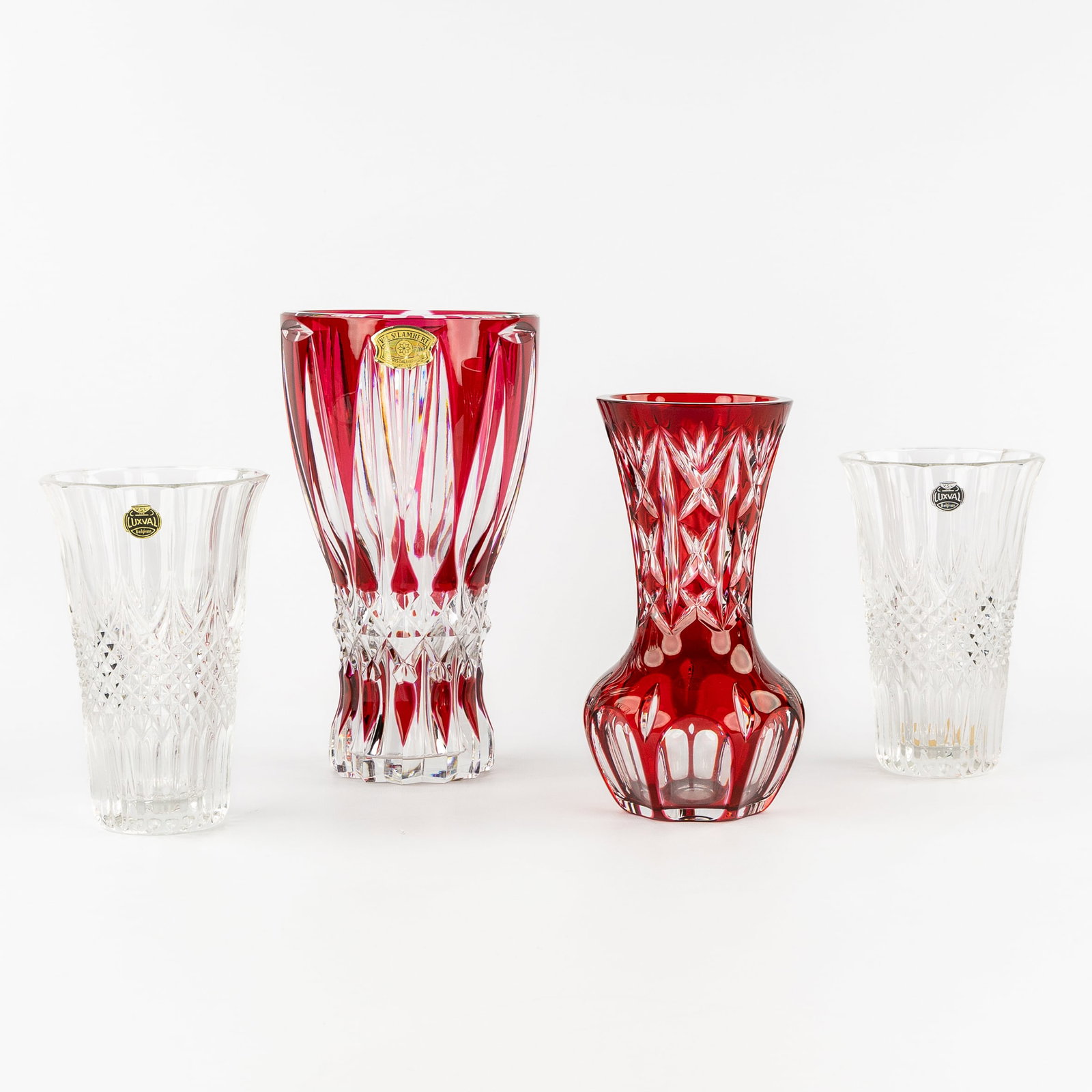 Val Saint Lambert & WMF, 4 vases. Cut and coloured glass/crystal. 20th century.: Val Saint Lambert & WMF, 4 vases. Cut and coloured glass/crystal. 20th century. Val Saint Lambert, large red vase. Cut and coloured crystal.28.5 x 16 cm. WMF, red vase. Cut and coloure