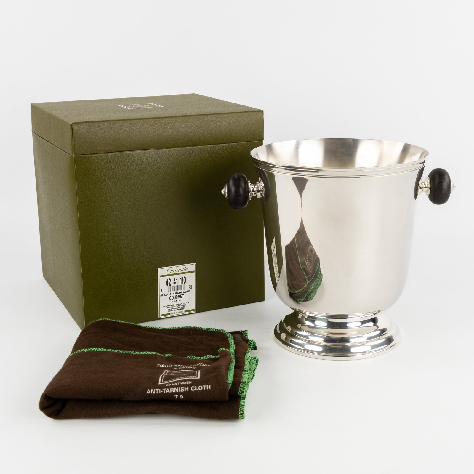 Christofle ‘Gourmet’, an Champagne bucket. Silver-plated metal and ebony.: Christofle ‘Gourmet’, an Champagne bucket. Silver-plated metal and ebony. The ice bucket is new in its box, with its original storage bag made from anti-tarnish fabric.Ebony and silver-pla