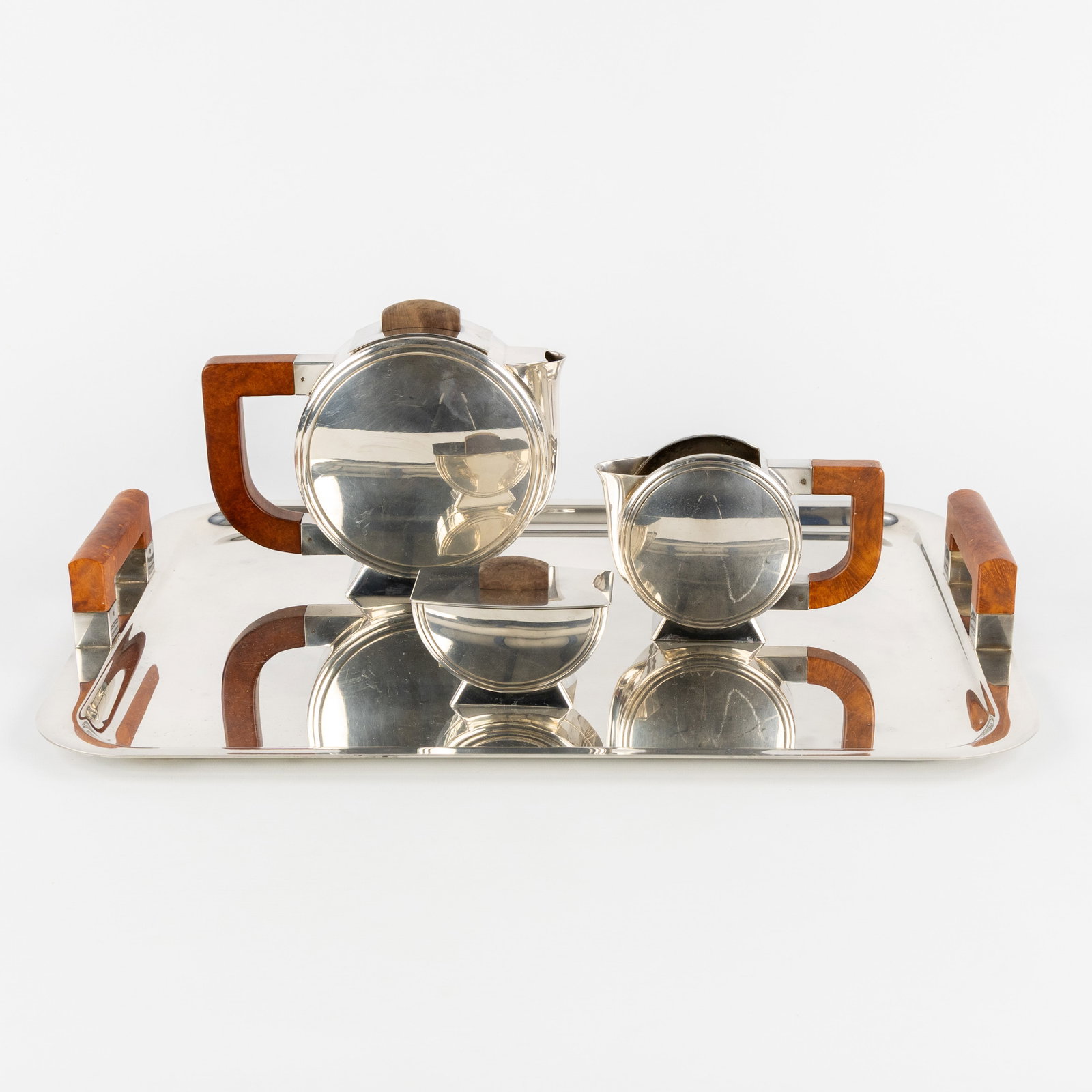 Christian Fjerdingstad (1891-1968) 'Coffee Service' for Christofle. Silver-plated metal. Art Deco: Christian Fjerdingstad (1891-1968) 'Coffee Service' for Christofle. Silver-plated metal. Art Deco style. Coffee pot Sugar Bowl Milk Jug Serving platter Designed in the Art Deco period, but this s