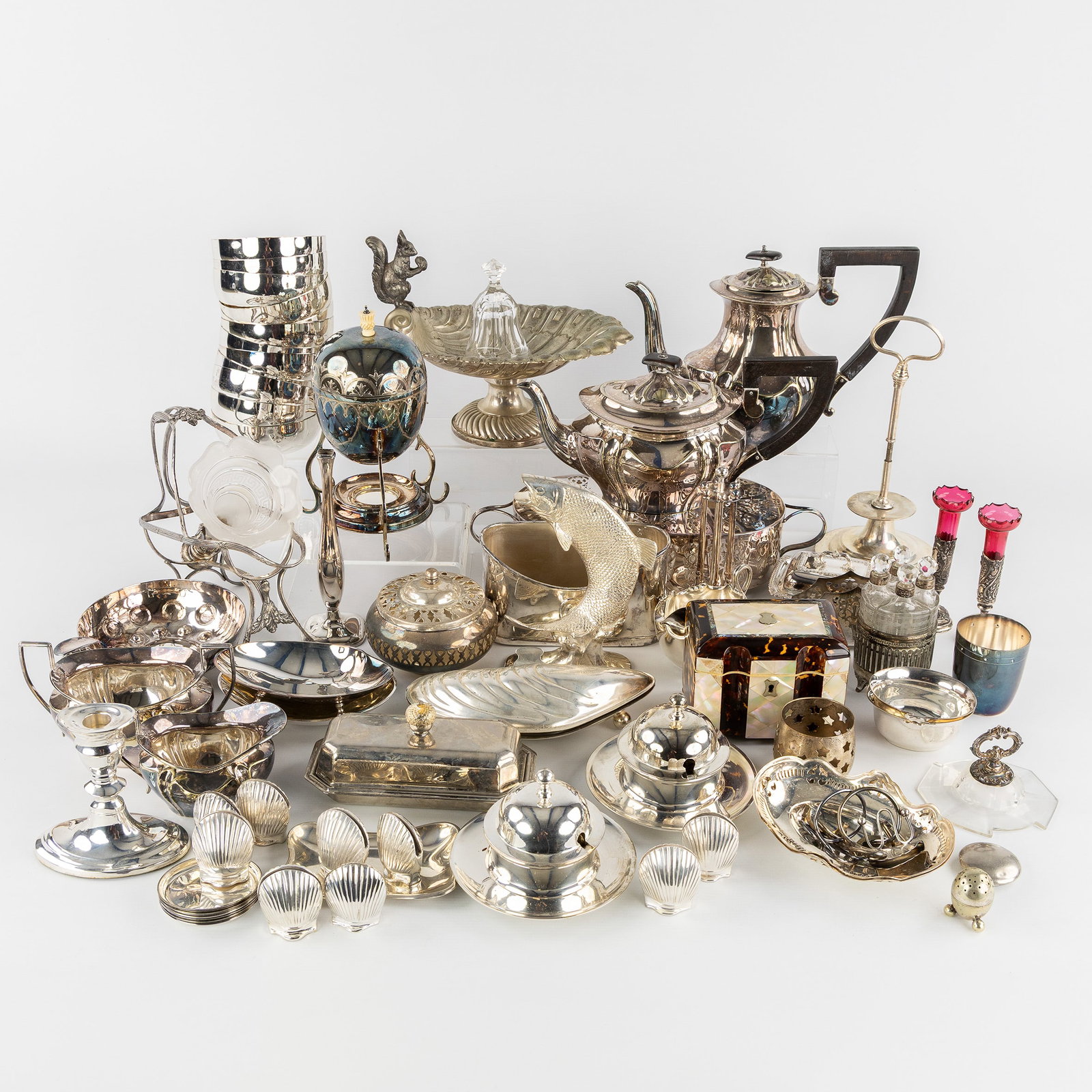 A Large collection of table accessories, including coffee and tea sets, finger bowls, circa 67: A Large collection of table accessories, including coffee and tea sets, finger bowls, butter dishes, and other items, circa 67 pieces, silver-plated metal. Silver-plated metal and glass/crystal.