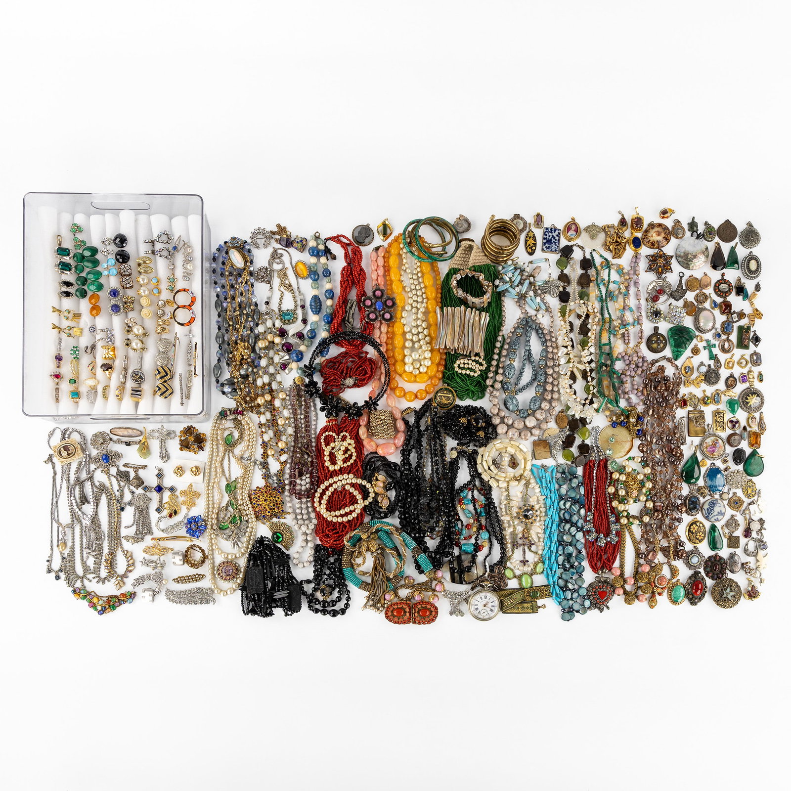 An Exceptionally large collection of faux bijoux with necklaces, rings, earrings, brooches, (1 of 9)