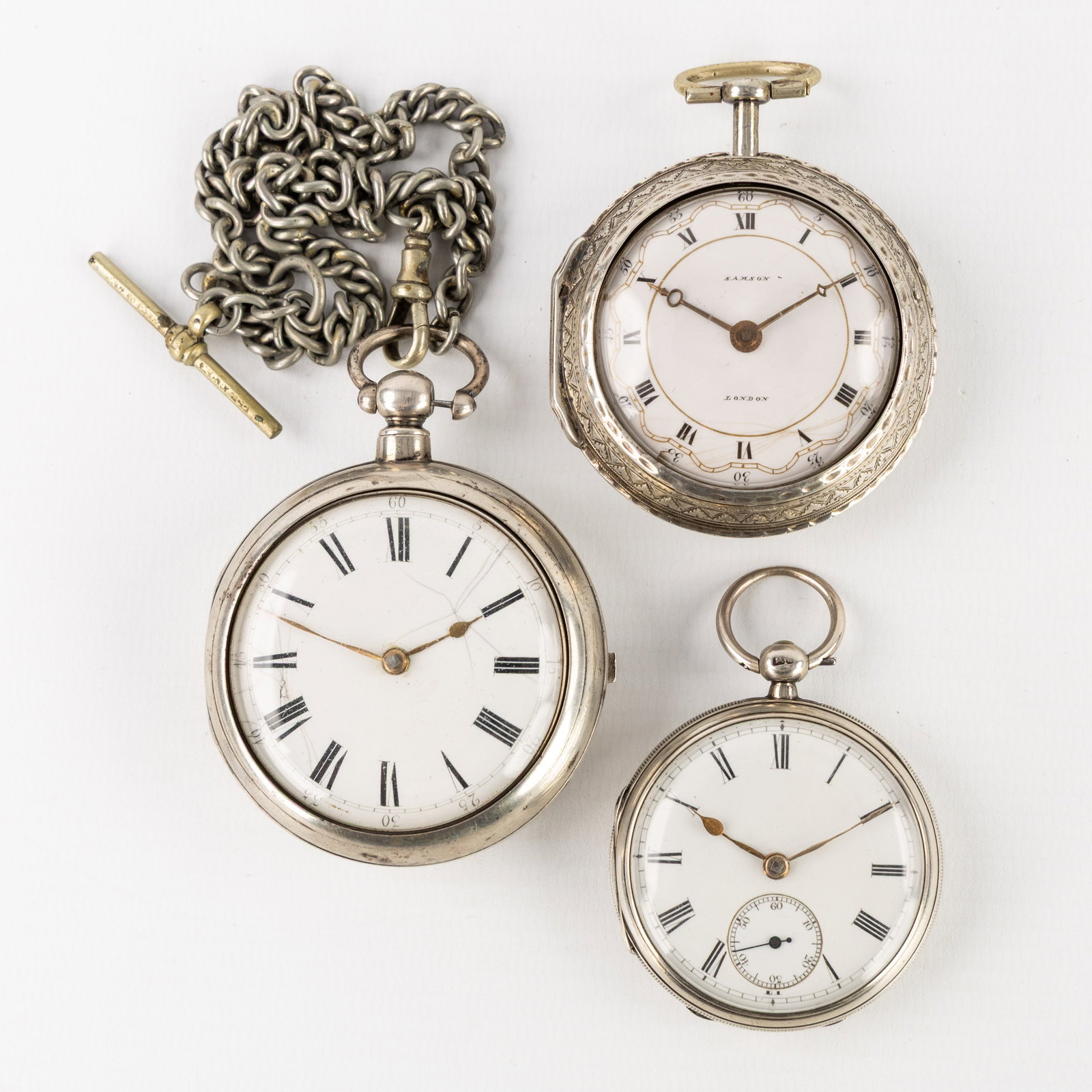 Three Antique silver pocket watches, Samson, Thomas Martin, and Collings & Wallis, England, 18th and: Three Antique silver pocket watches, Samson, Thomas Martin, and Collings & Wallis, England, 18th and 19th century. Samson, London. Double watch case. Outer case decorated with a repoussé scen