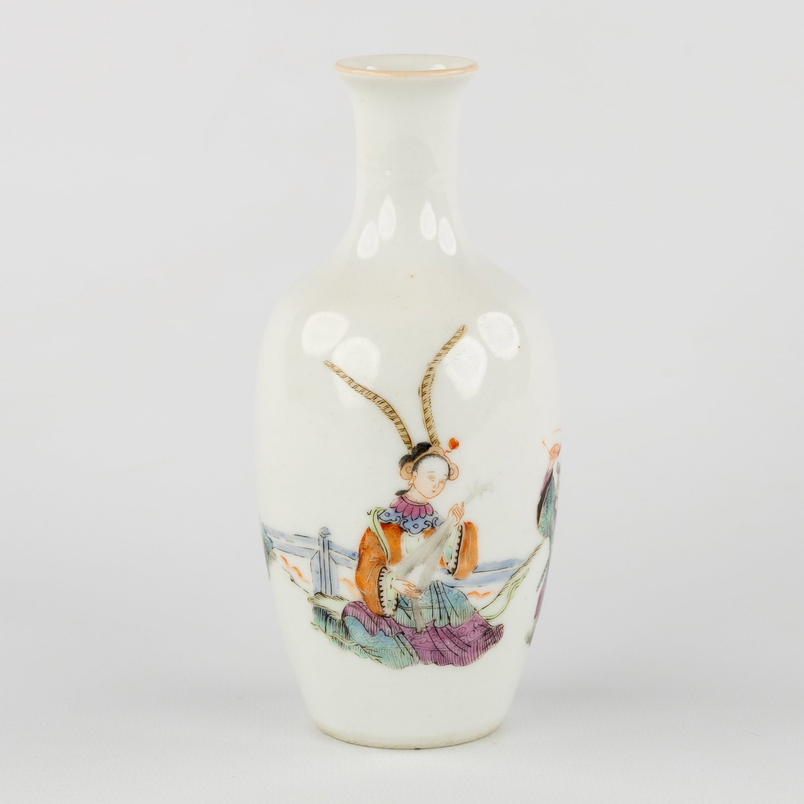 A Small baluster vase, Famille Rose, with figurative decor, marked Xianfeng, 19th/20th C.: A Small baluster vase, Famille Rose, with figurative decor, marked Xianfeng, 19th/20th century. Chinese porcelain, Famille Rose.Decorated with a Chinese lady with a pipa (pear-shaped lute) (probably W