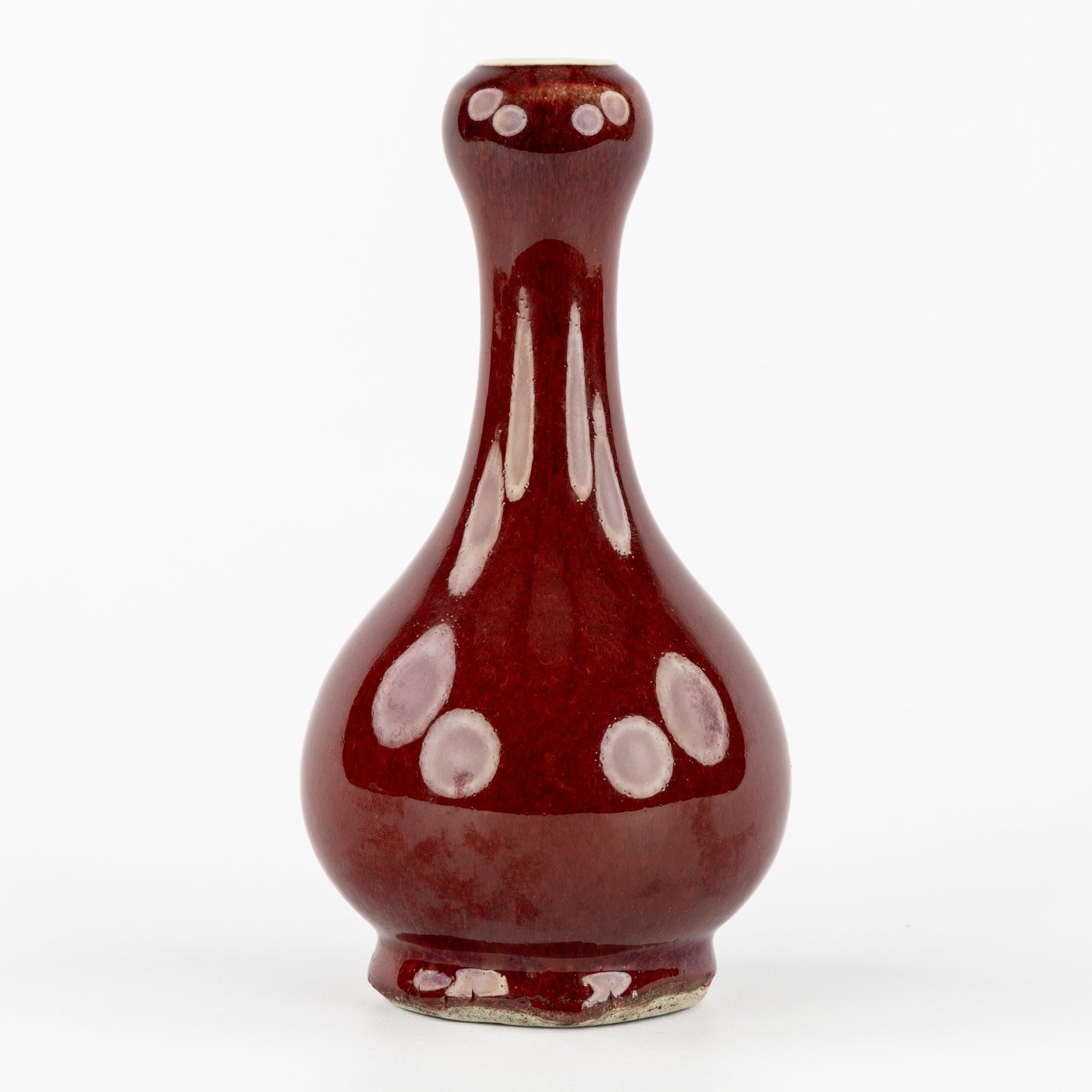 A Small Chinese garlic mouth vase, monochrome sang de boeuf glazed, 19th/20th C. (1 of 6)
