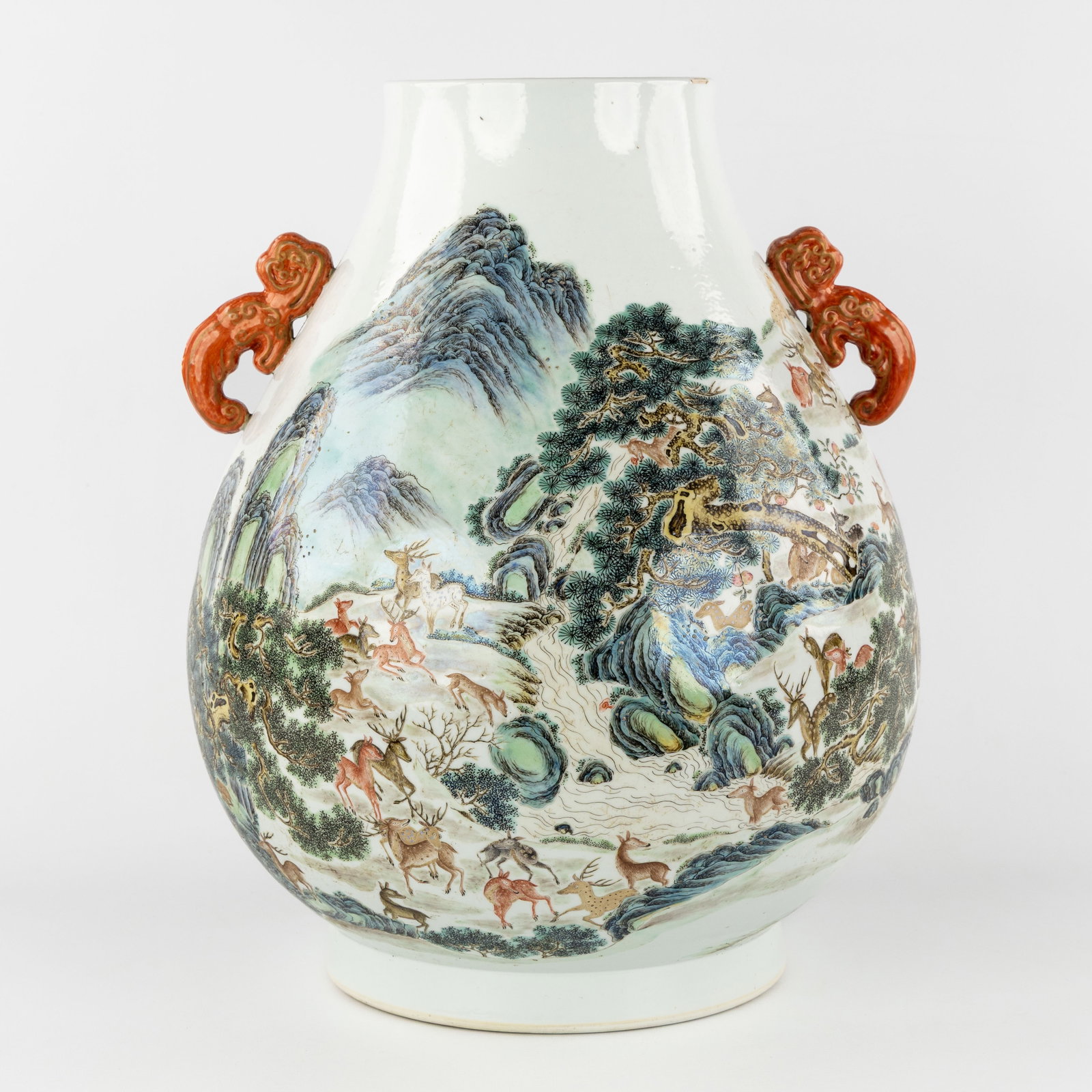 A Large Chinese 'Hundred Deer' Hu vase, Famille Rose, marked Qianlong, late 19th C.: A Large Chinese 'Hundred Deer' Hu vase, Famille Rose, marked Qianlong, late 19th century. Chinese porcelain. Famille Rose.Hundred Deer decor.Iron-red handles in the shape of Linghzi.Marke