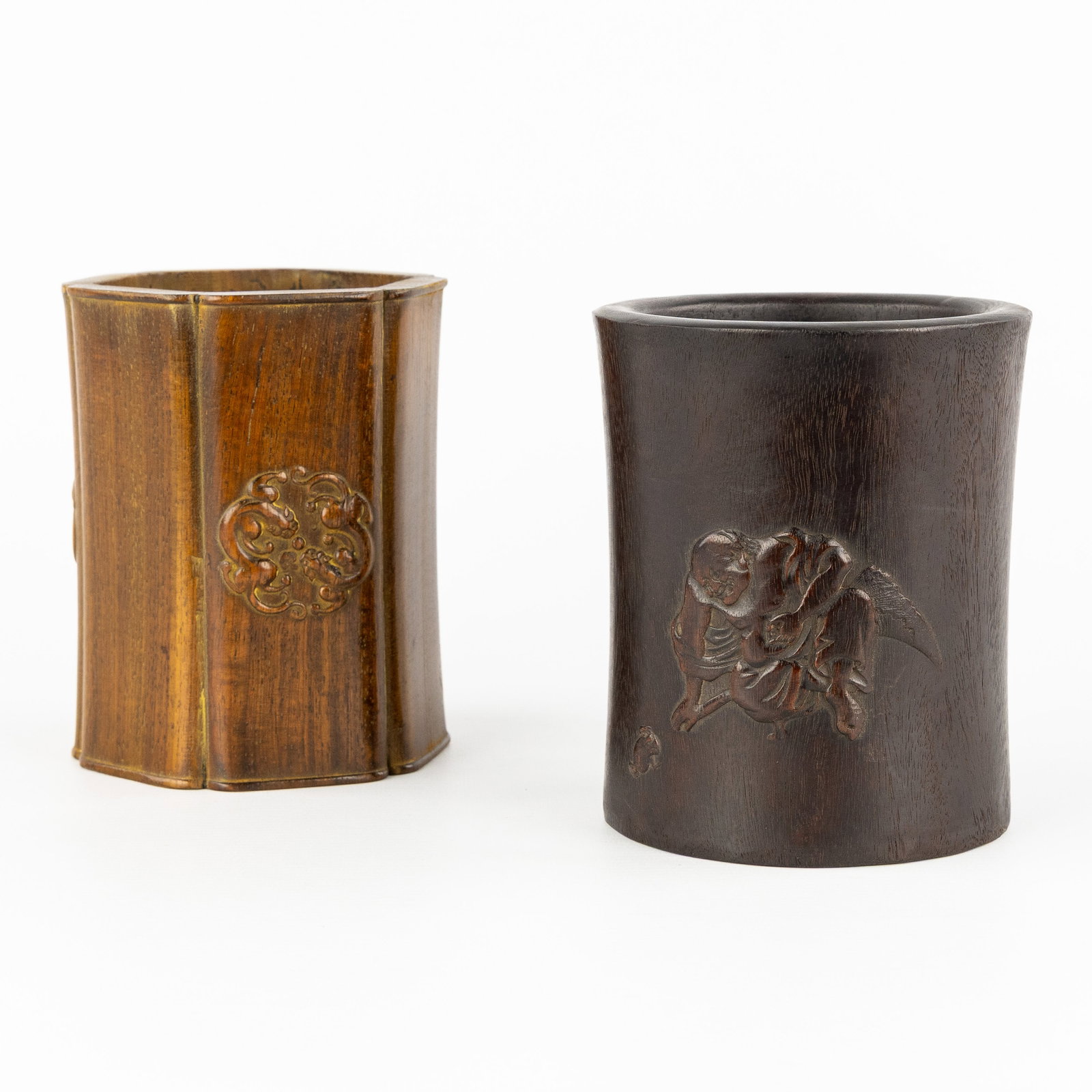Two Brush pots, decorated with Liu Hai and Dragons, hardwood, Jiading style, 19th/20th C.: Two Brush pots, decorated with Liu Hai and Dragons, 