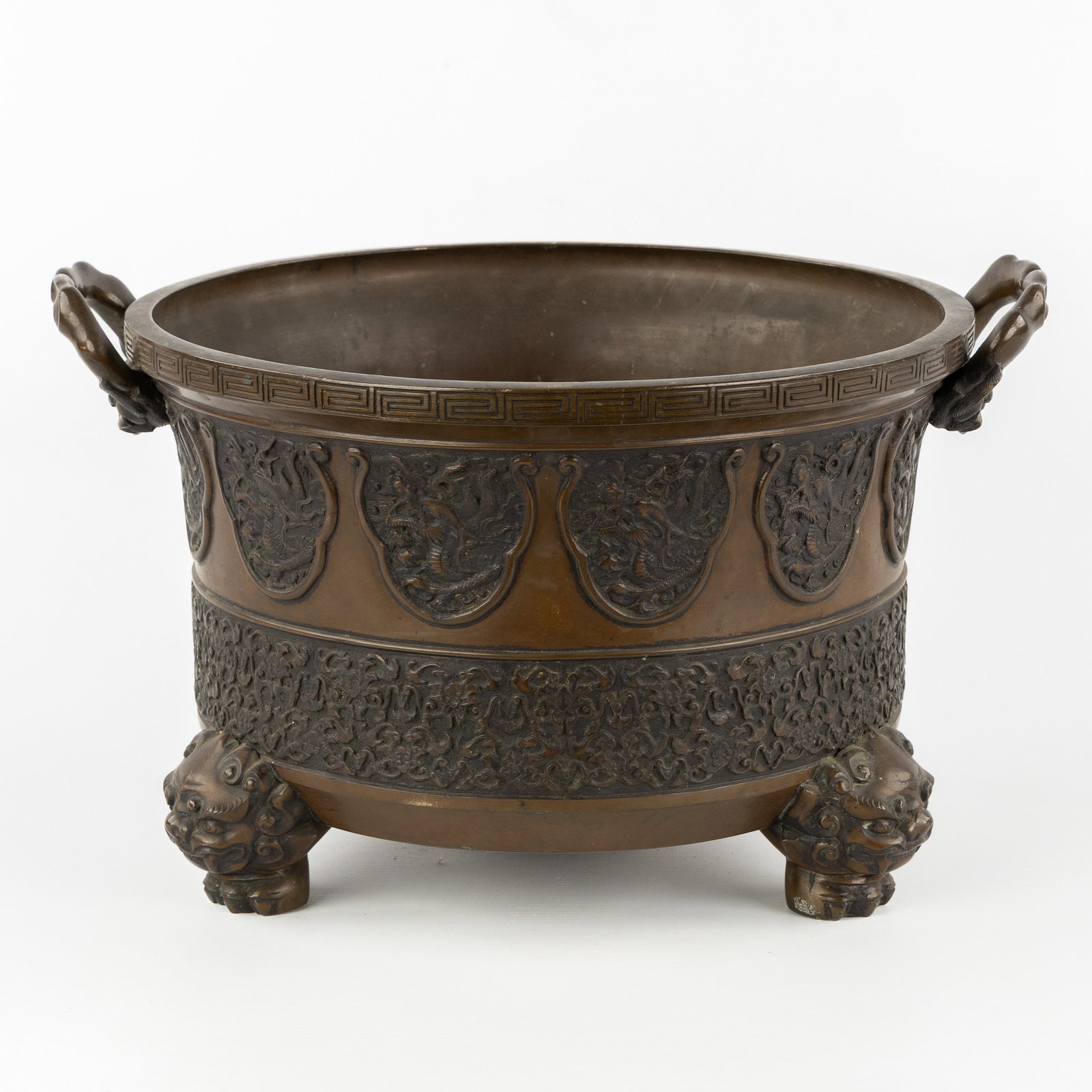 A Japanese bronze Hibachi or fire basket, decorated with Dragons and Foo Dogs, Meiji, 19th/20th C. (1 of 10)