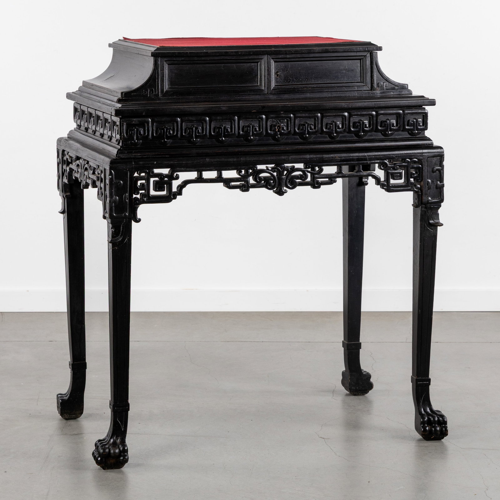 A Chinese writing desk or secretary, sculptured wood with openwork carvings, 19th/20th C. (1 of 10)