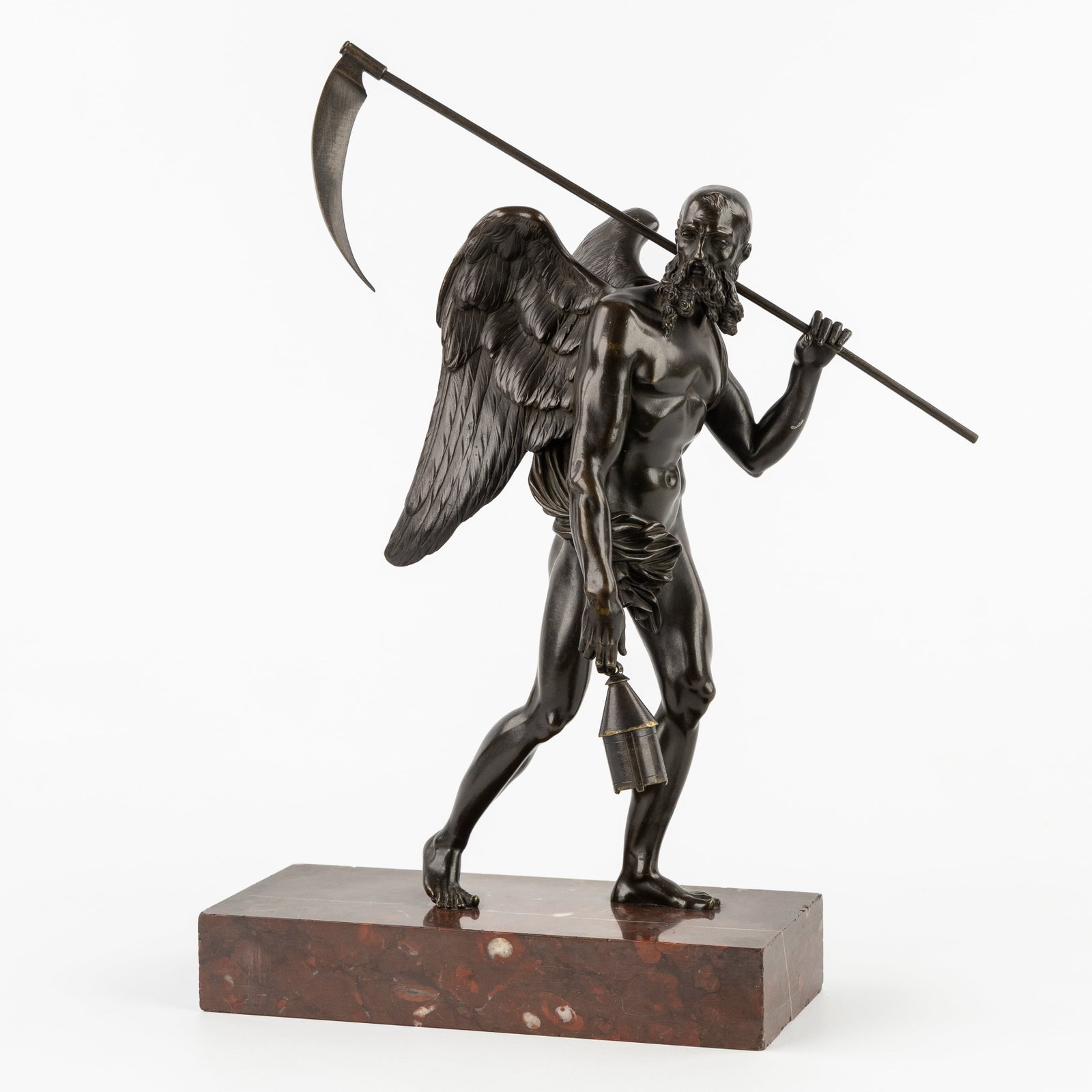 A bronze sculpture of Chronos, mounted on a marble base. Patinated bronze and marble, 19th/20th C. (1 of 10)