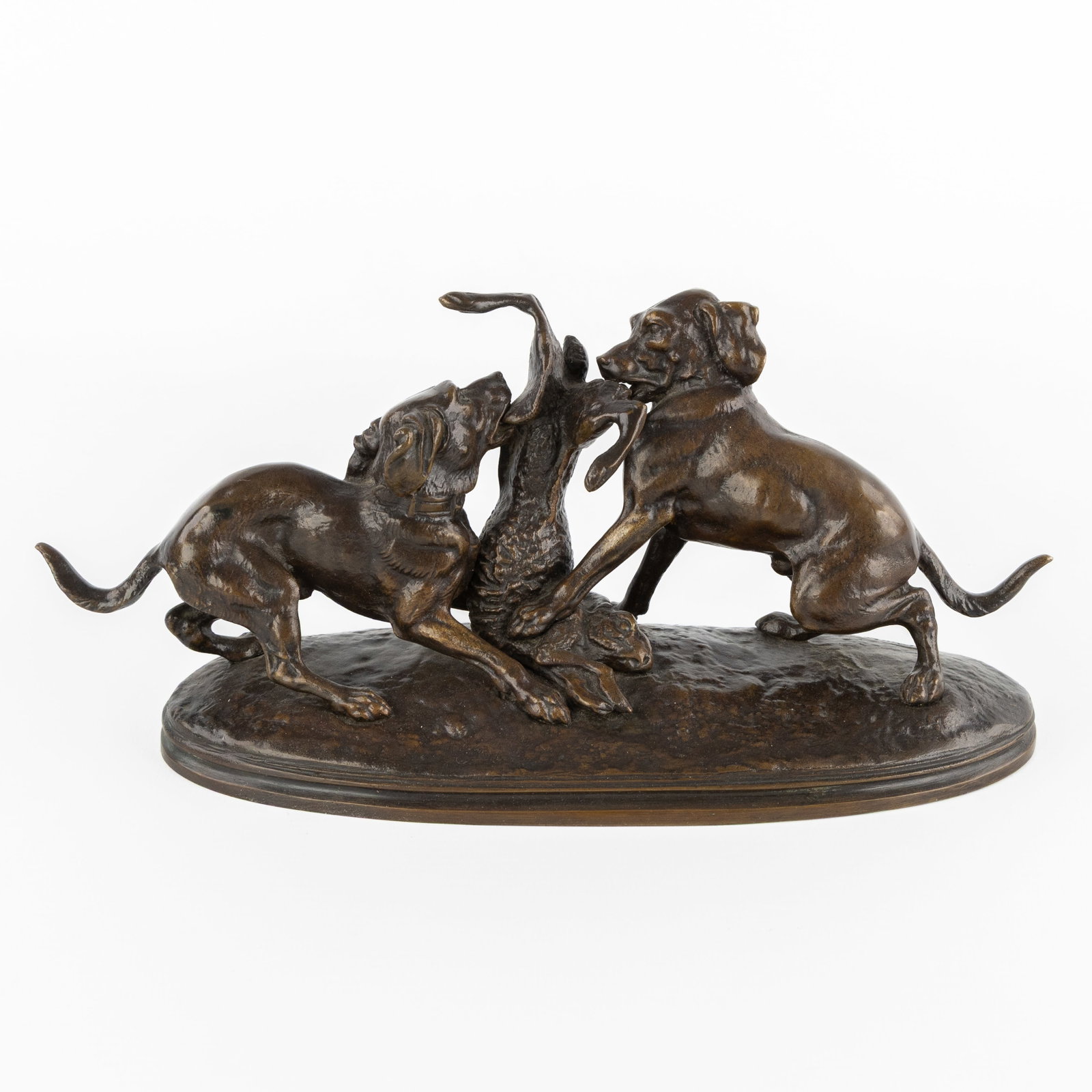 Jules Moigniez (1835-1894) 'Two Hunting Dogs with a Hare', patinated bronze.: Jules Moigniez (1835-1894) 'Two Hunting Dogs with a Hare', patinated bronze. Patinated bronze.Signed 'J. Moigniez'. (26 x 11 x 9 cm)