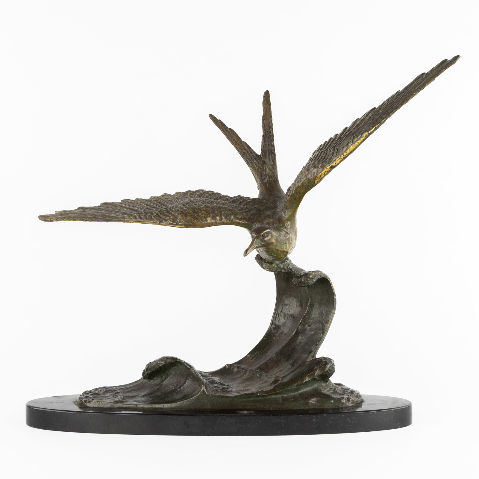 Fonderie Erget, 'Seabird', patinated bronze, Art Deco, France.: Fonderie Erget, 'Seabird', patinated bronze, Art Deco, France. Patinated bronze, mounted on a black marble base.Depiction of a seabird or seagull gliding on a wave.Signed 'Bronze par Erget'.