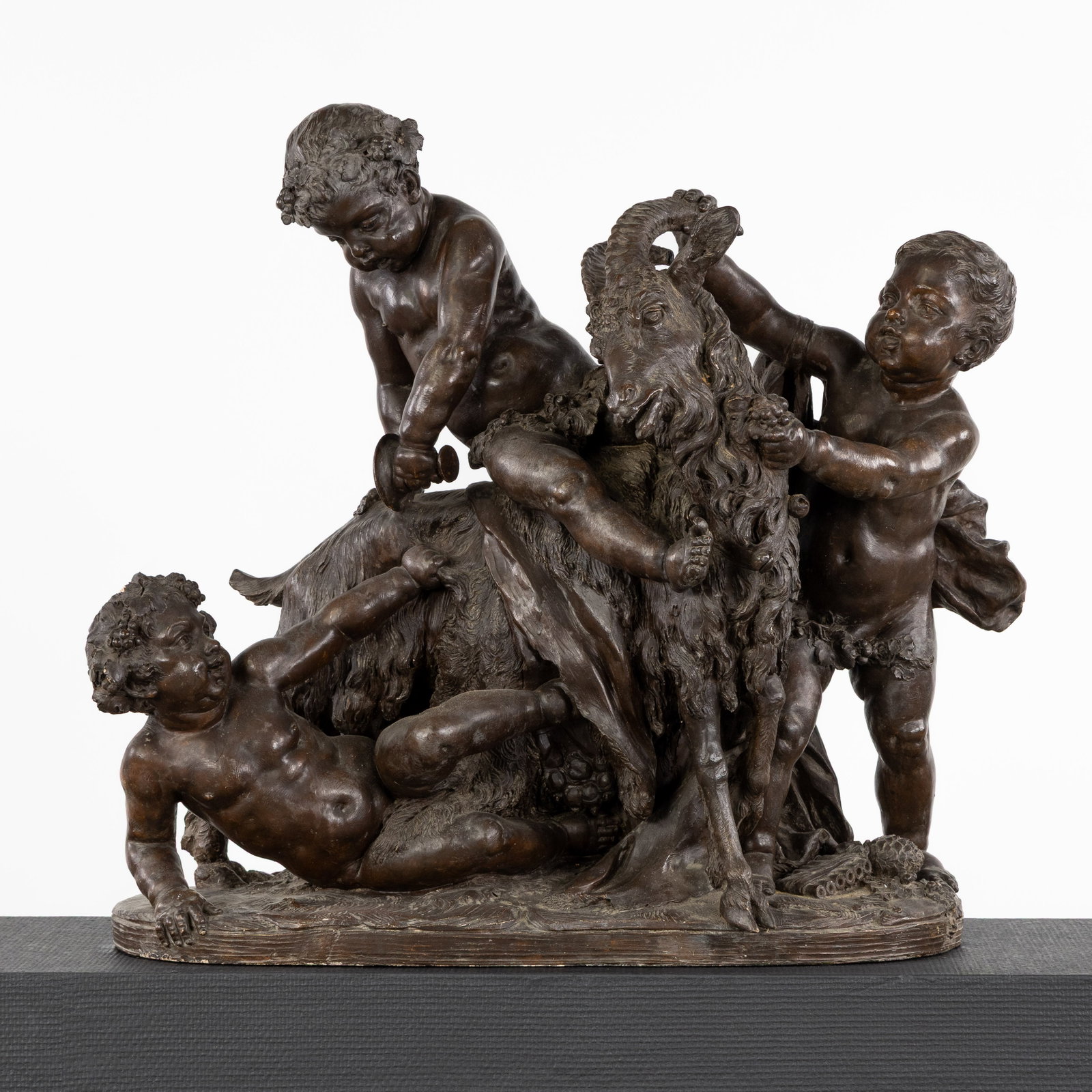 Clodion (1738-1814) 'Putti Playing with a Goat', a large figurative group, patinated terracotta. (1 of 15)