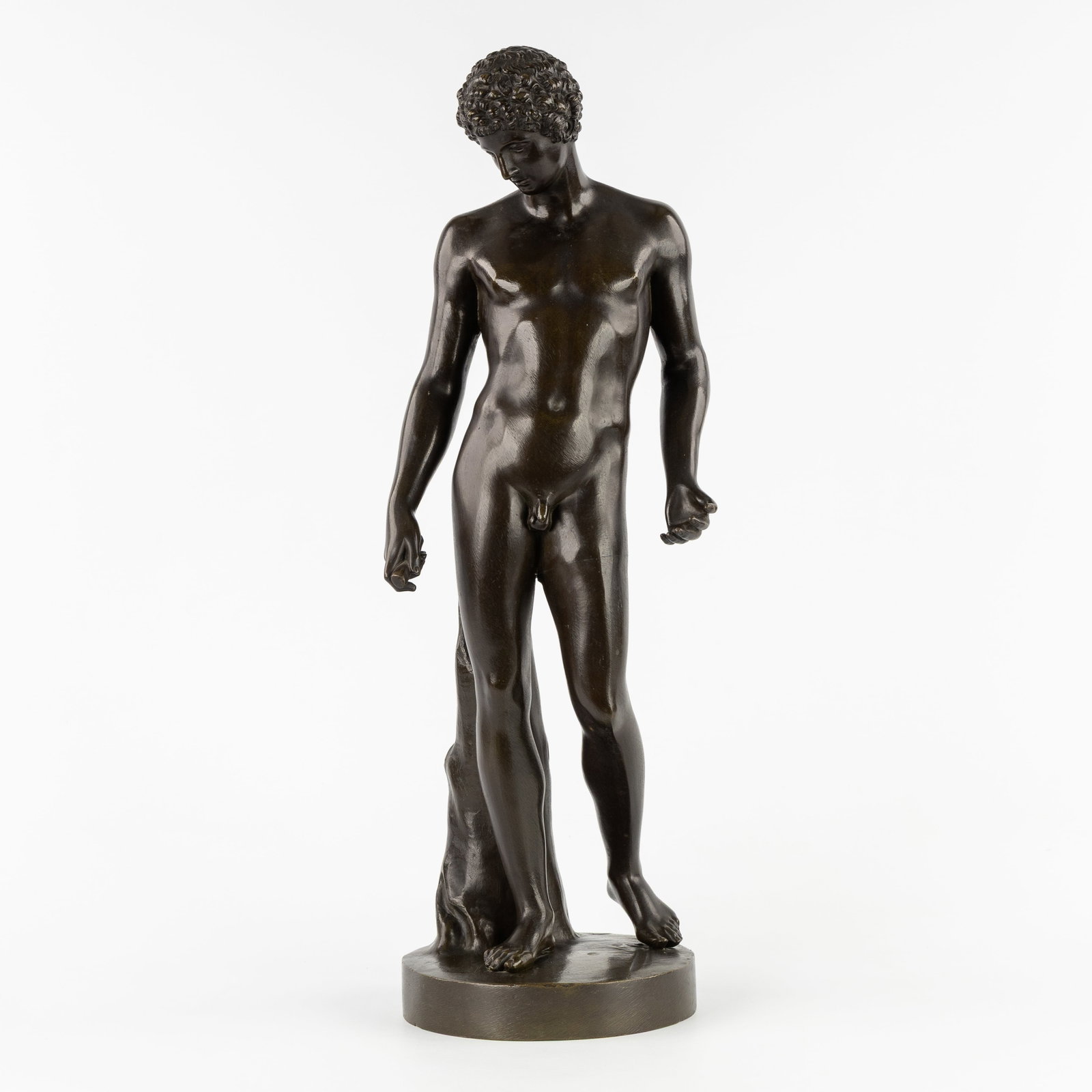 After the Ancients, 'Antinous', sculpture after the Capitoline Antinous. Patinated bronze, circa: After the Ancients, 'Antinous', sculpture after the Capitoline Antinous. Patinated bronze, circa 1900. Patinated bronze.Likeness of Antinous, the ancient lover of Hadrian and legendary martyr. </