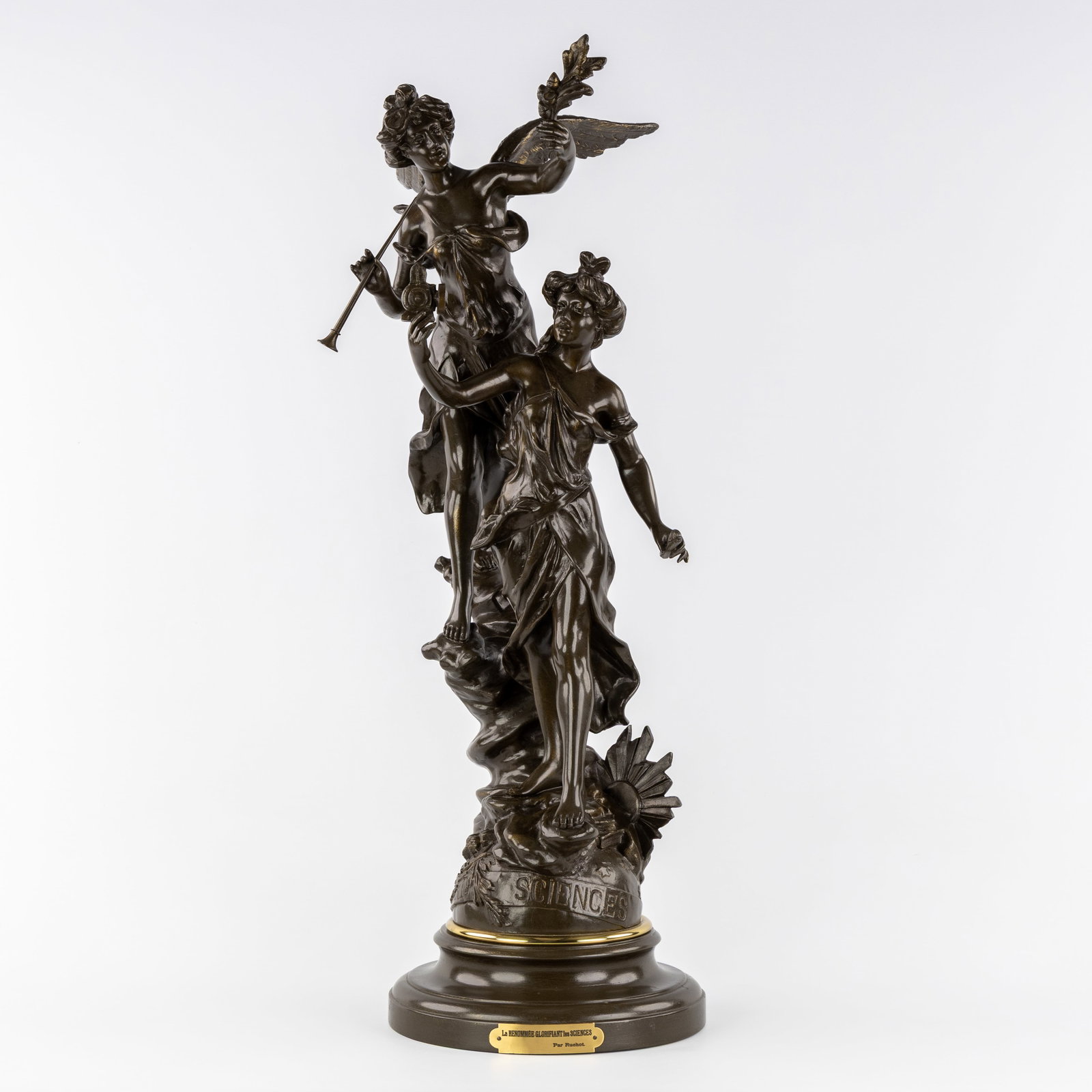 Charles Ruchot (active 1880–1925) 'La Renommée Glorifiant les Sciences', patinated: Charles Ruchot (active 1880–1925) 'La Renommée Glorifiant les Sciences', patinated spelter. Patinated spelter.Signed 'Ch. Ruchot'.Mounted on a wooden base. (39 x 81 x 36 cm)