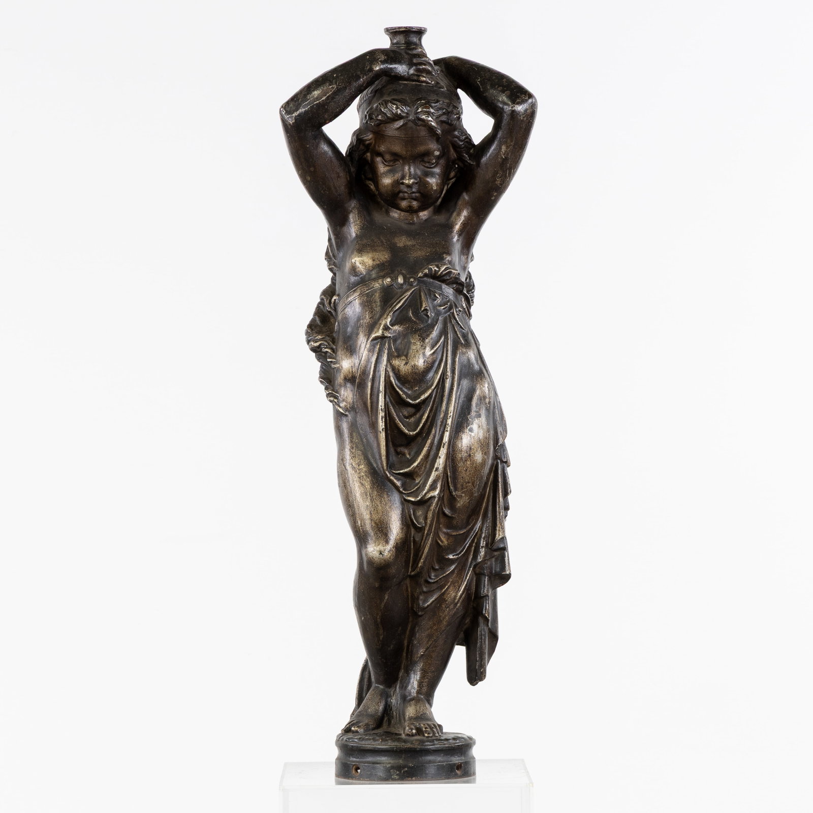 Antoine Durenne (1822-1895) a flambeau or putto light bearer, patinated cast iron, Sommevoire: Antoine Durenne (1822-1895) a flambeau or putto light bearer, patinated cast iron, Sommevoire foundry, France, circa 1860. Patinated cast iron.Flambeau, candle holder, candlestick, or light bearer in 
