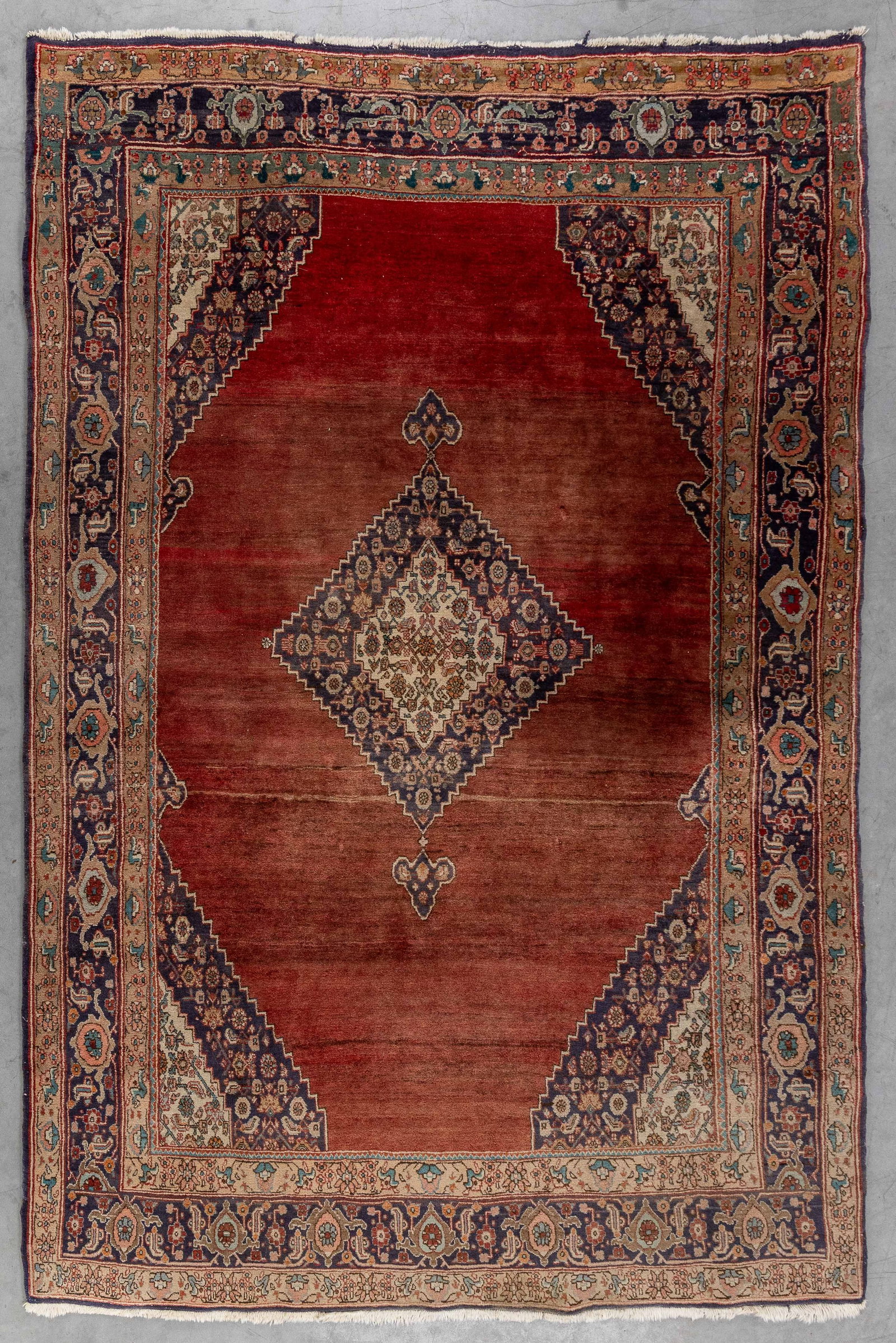 An Oriental hand-made carpet, Tabriz, Iran (259 x 168 cm). (1 of 6)