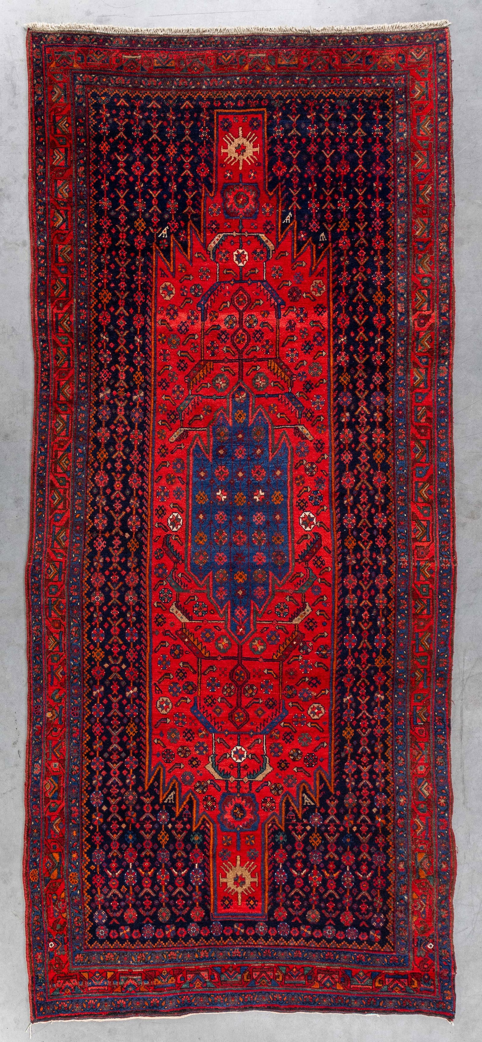 An Oriental hand-made carpet, Bijar, Iran (336 x 145 cm).: An Oriental hand-made carpet, Bijar, Iran (336 x 145 cm). (145 x 336 x 0 cm)