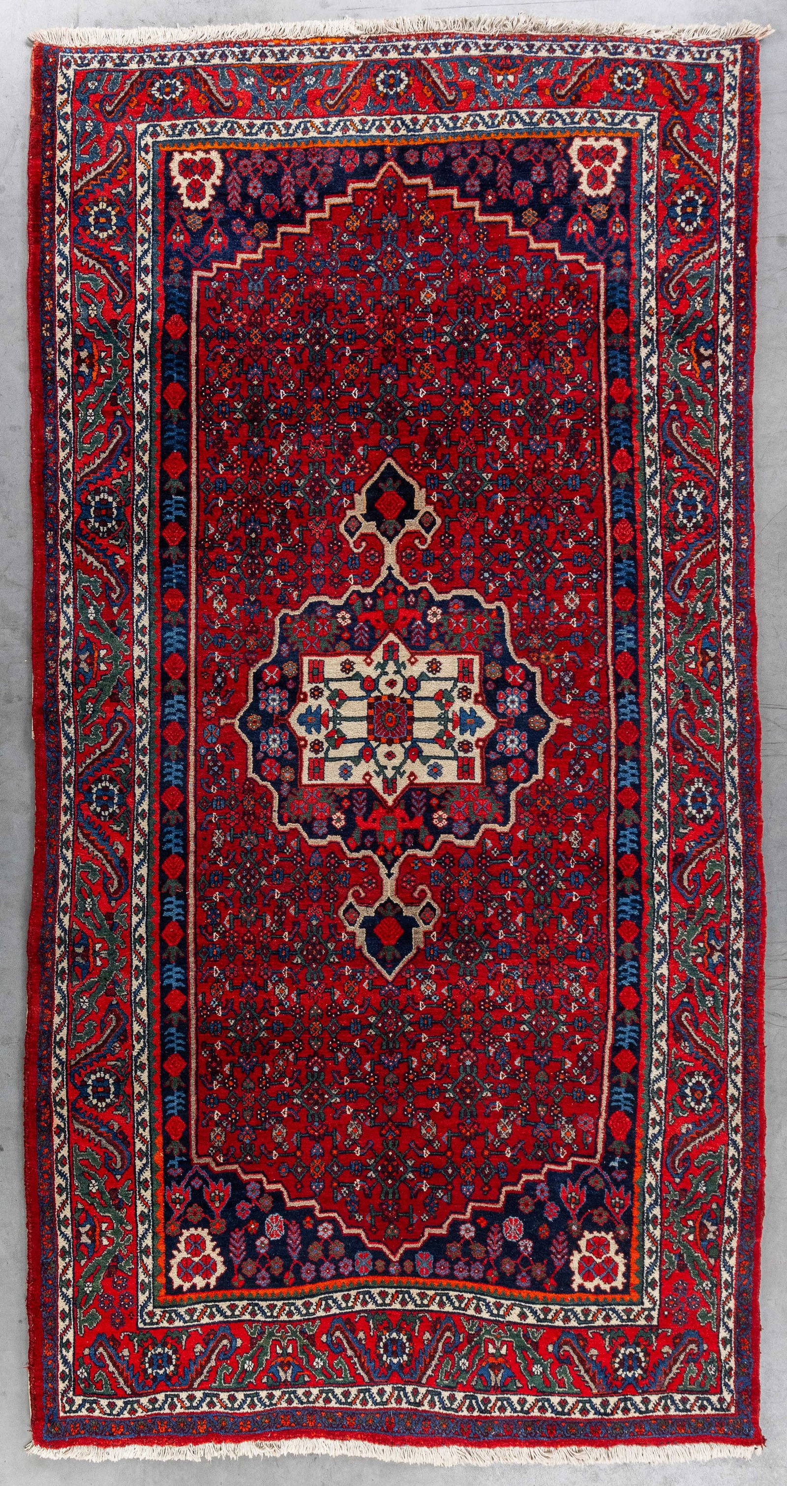 An Oriental hand-made carpet, Bijar, Iran (154 x 298 cm).: An Oriental hand-made carpet, Bijar, Iran (154 x 298 cm). (154 x 298 x 0 cm)
