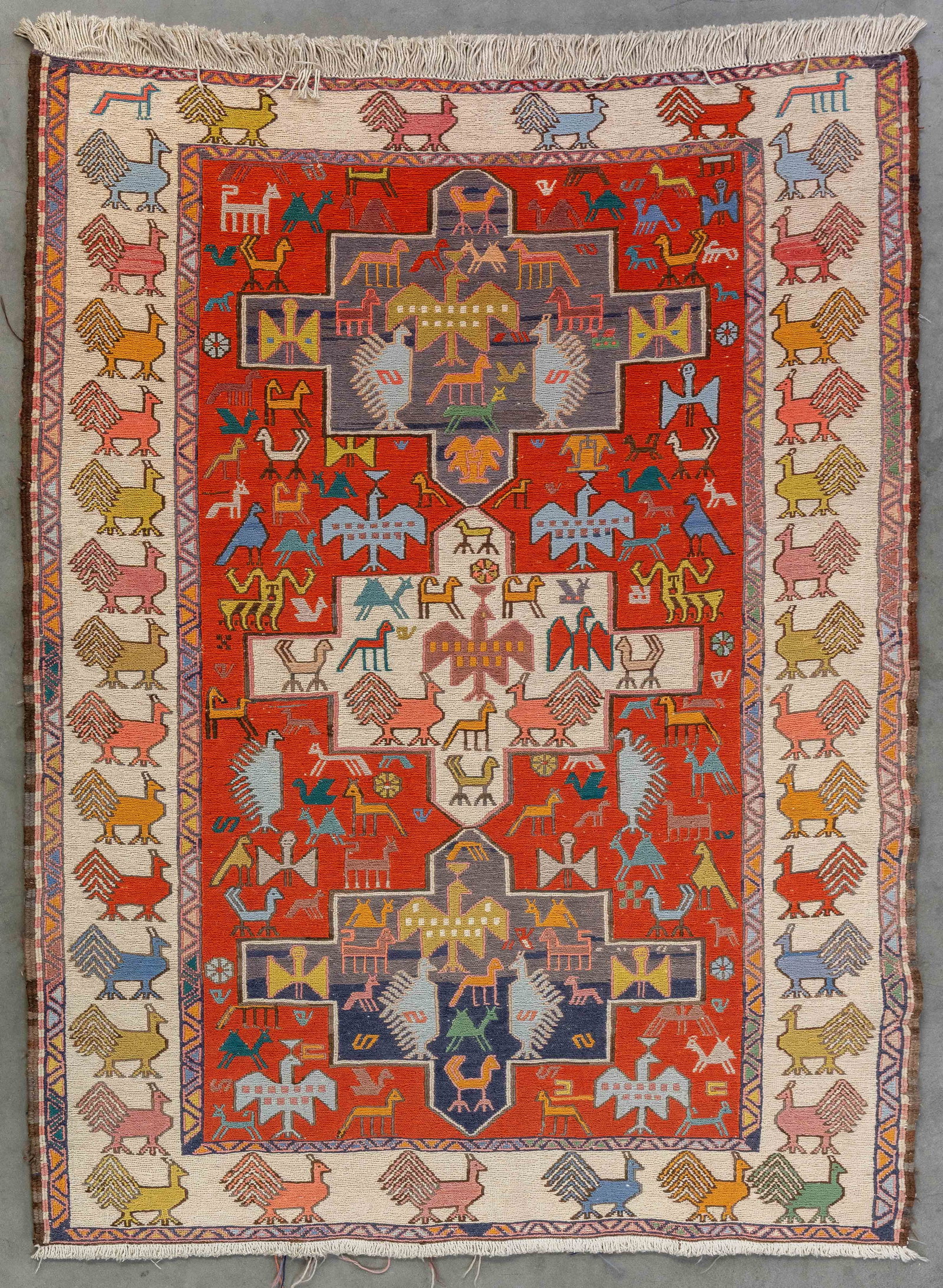 An Oriental hand-made carpet, Soumak, Iran (108 x 142 cm).: An Oriental hand-made carpet, Soumak, Iran (108 x 142 cm). (108 x 0 x 142 cm)
