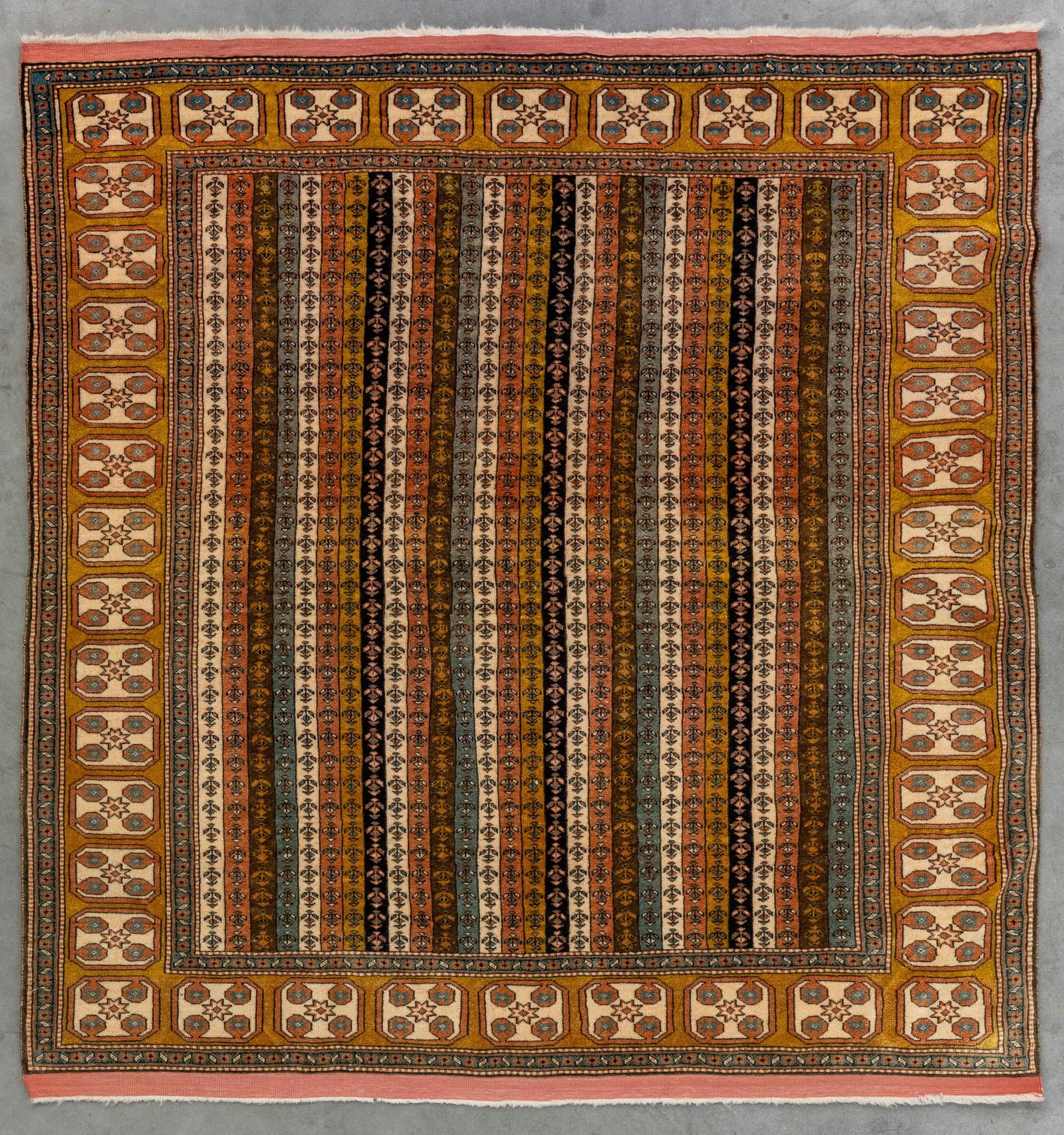 An Oriental hand-made carpet, Samarkand, Persia (137 x 146 cm).: An Oriental hand-made carpet, Samarkand, Persia (137 x 146 cm). (137 x 0 x 146 cm)