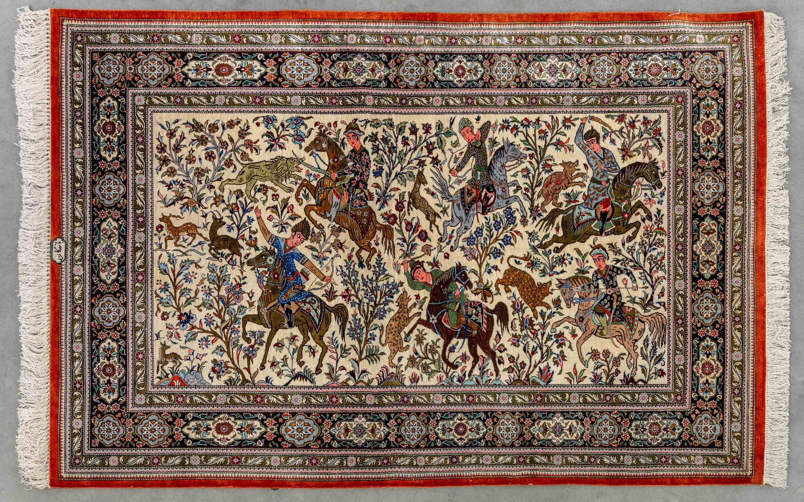 An Oriental hand-made carpet, Ghoum, Iran, silk, signed (153 x 105 cm).: An Oriental hand-made carpet, Ghoum, Iran, silk, signed (153 x 105 cm). (153 x 0 x 105 cm)
