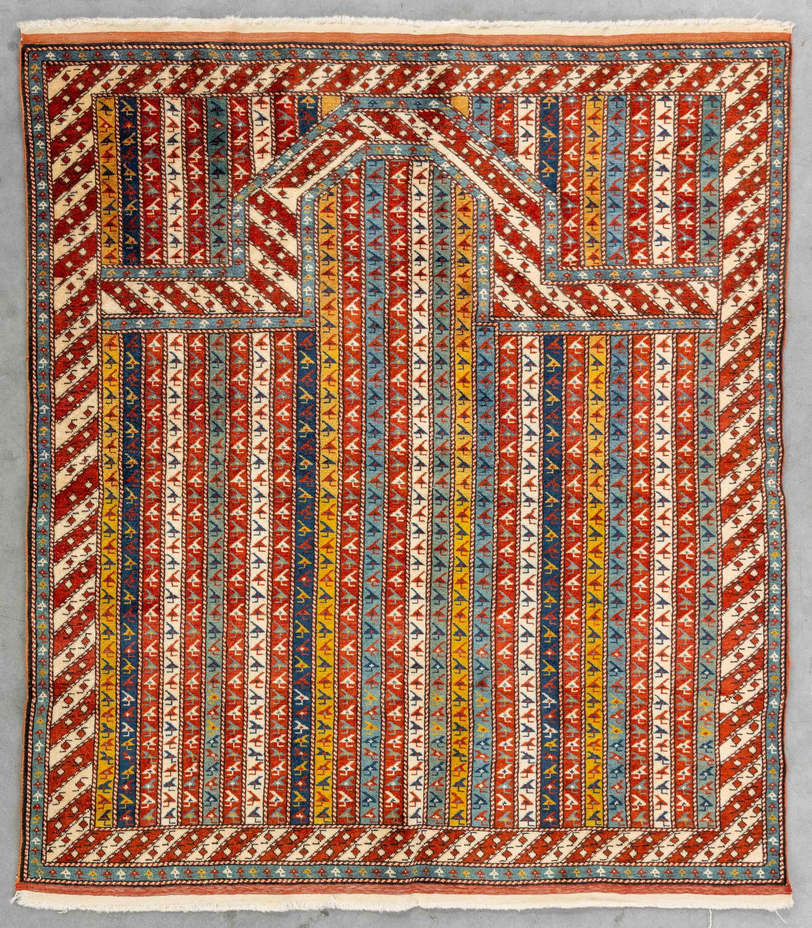 An Oriental hand-made carpet, Samarkand, Persia (132 x 143 cm).: An Oriental hand-made carpet, Samarkand, Persia (132 x 143 cm). (132 x 0 x 143 cm)