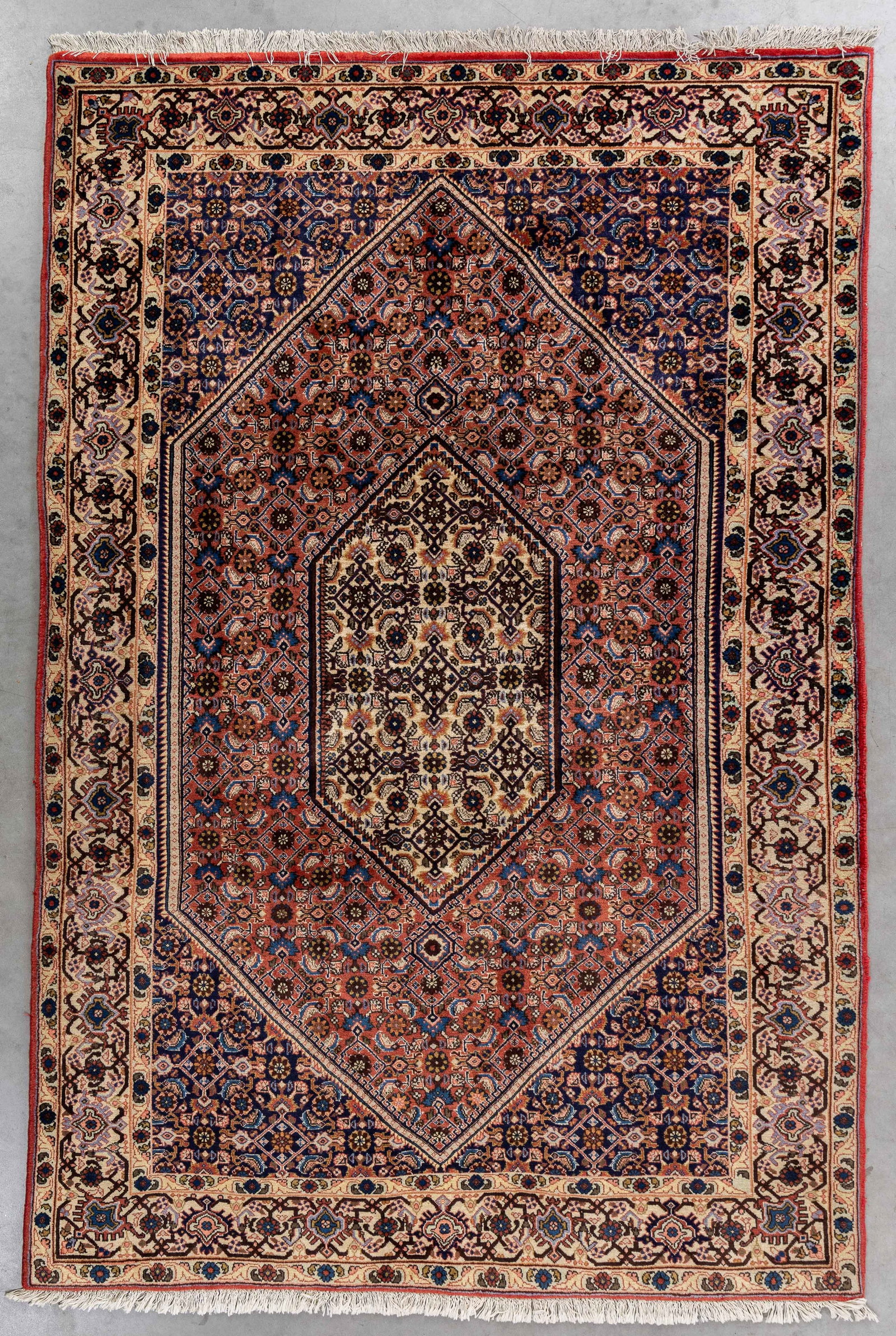 An Oriental hand-made carpet, Bidjar, Iran (243 x 157 cm).: An Oriental hand-made carpet, Bidjar, Iran (243 x 157 cm). (157 x 243 x 0 cm)
