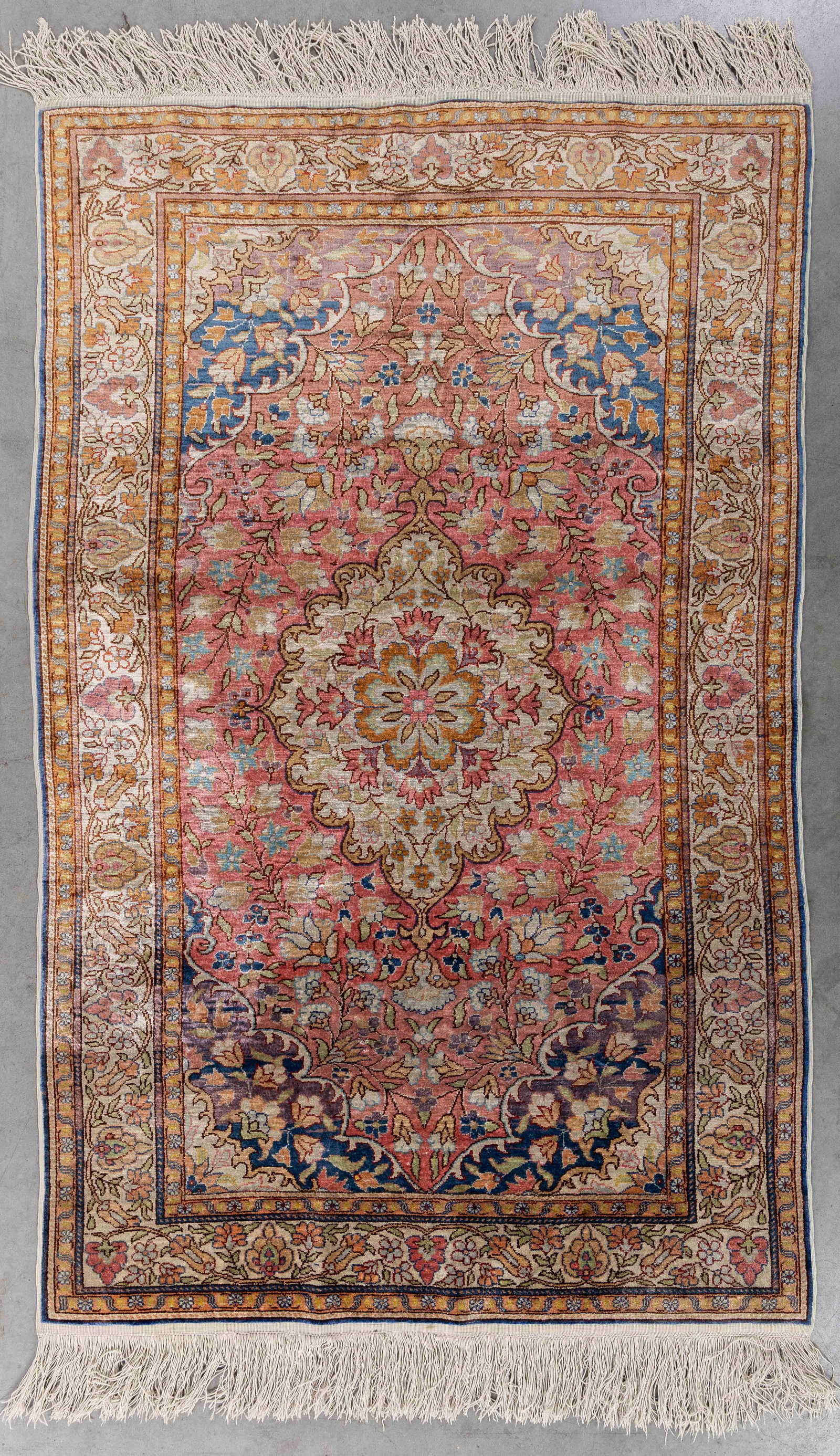 A Persian hand-made carpet, wool and silk (134 x 84 cm). (1 of 5)