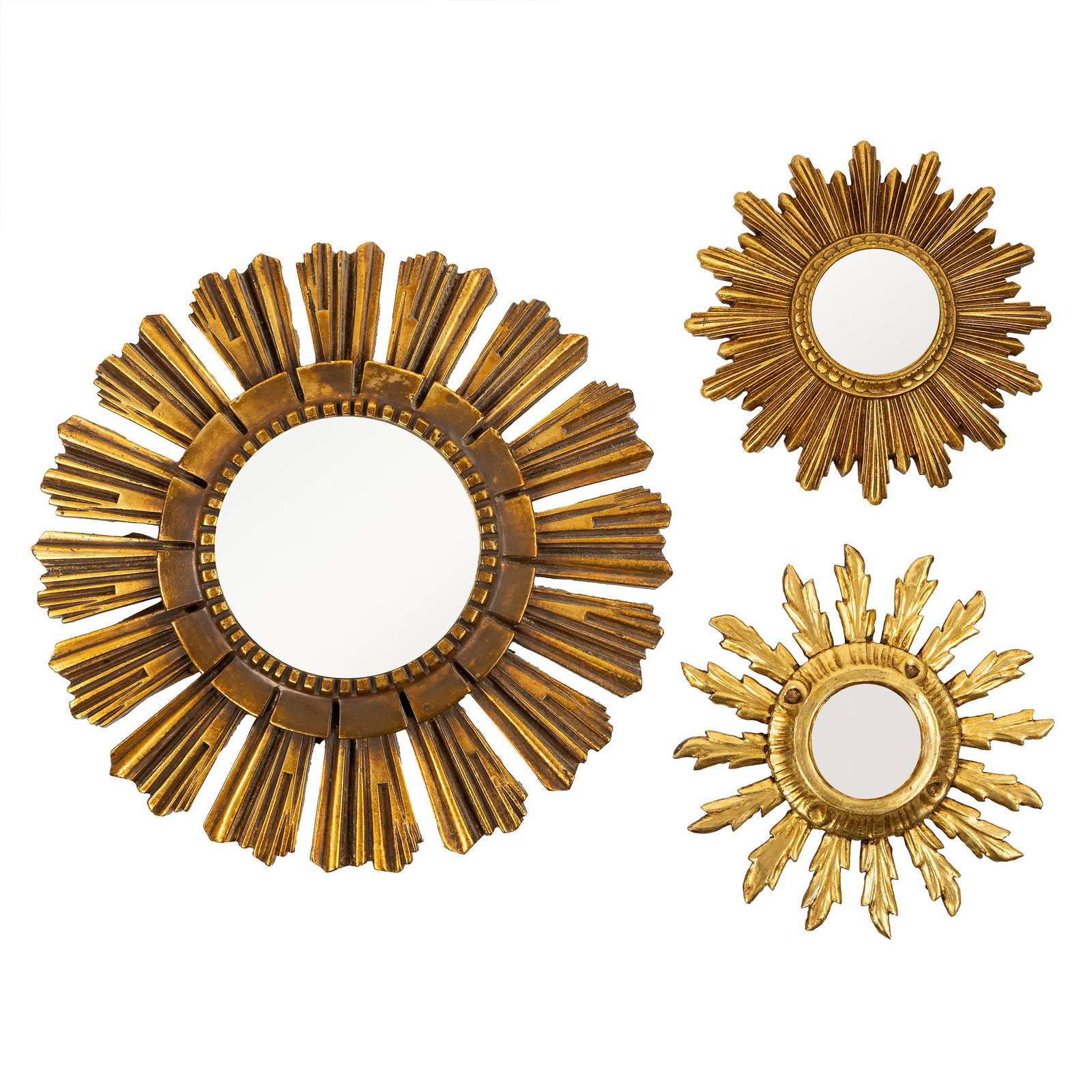 Three Mid-Century sunburst mirrors, gilded wood and resin, convex and plain glass. Circa 1970. (1 of 6)