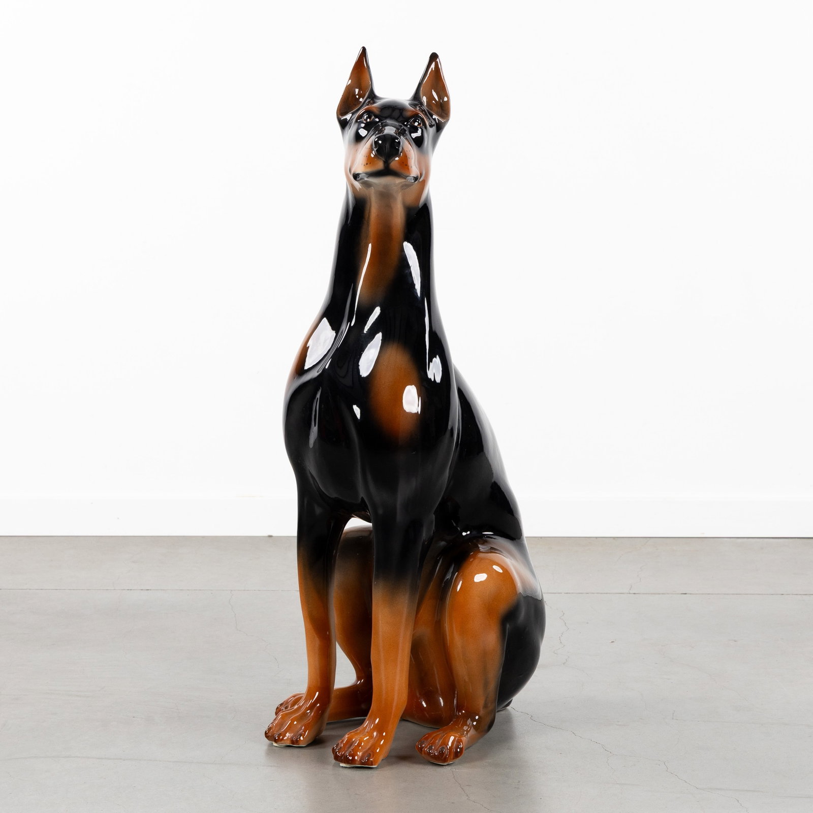 A Dobermann, polychrome glazed ceramic, Italy, 20th C. (1 of 9)